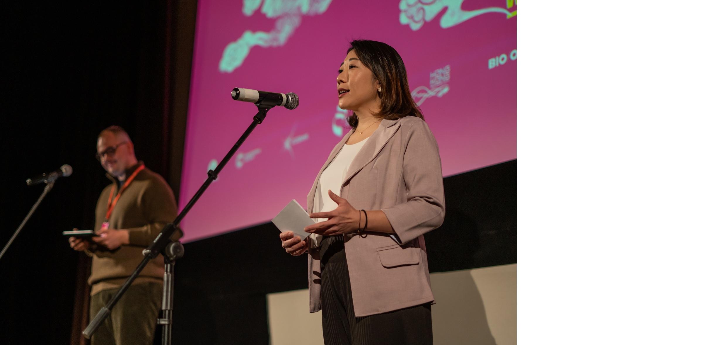 The Hong Kong Economic and Trade Office, Berlin supported the screening of Hong Kong films at the 20th edition of the Filmasia Asian Film Festival. Photo shows the Director of the Hong Kong Economic and Trade Office, Berlin, Ms Jenny Szeto, speaking before the screening of opening film "Fly Me To The Moon" on December 5 (Prague time).