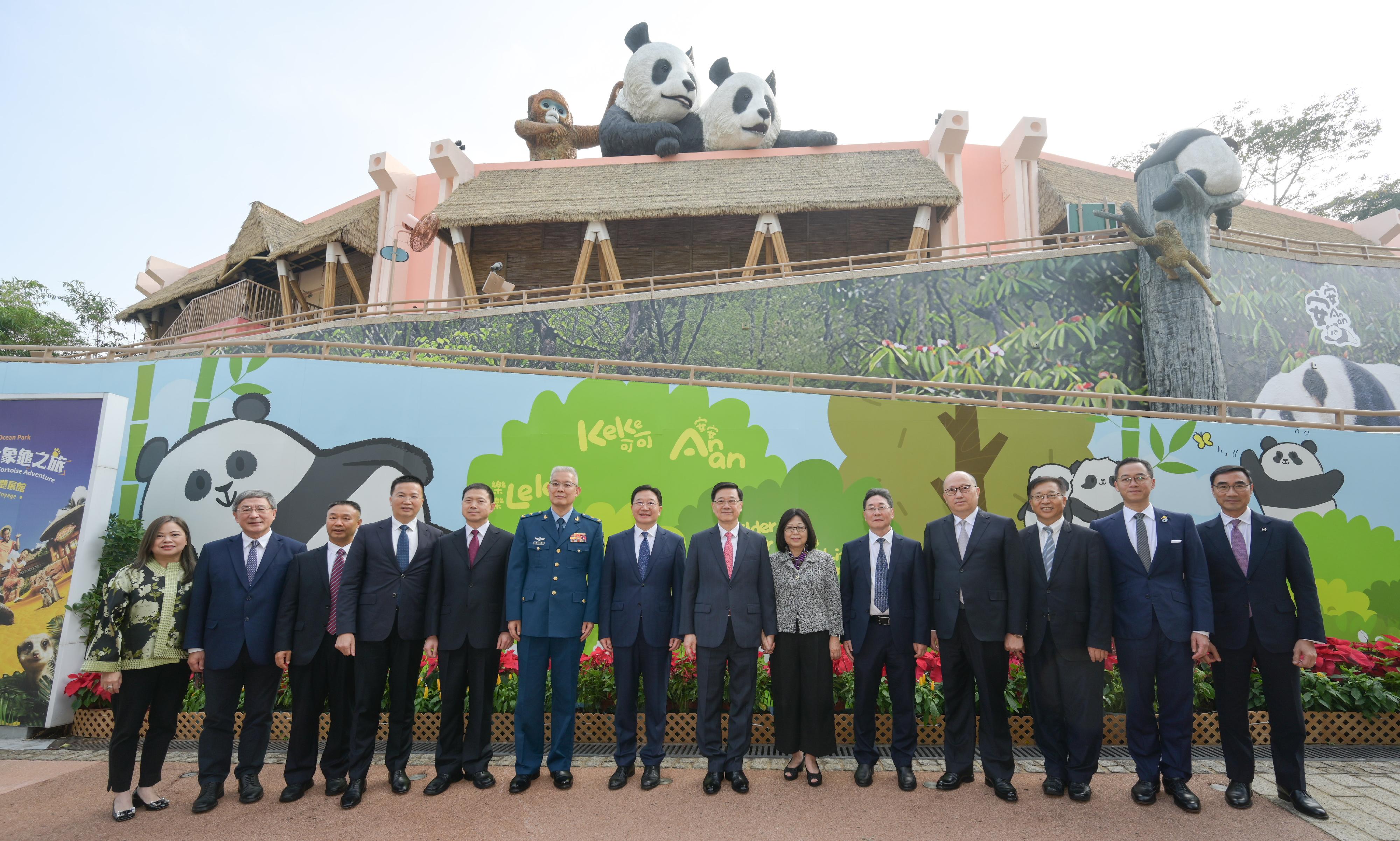 The Chief Executive, Mr John Lee, attended the Giant Panda Greeting Ceremony at the Ocean Park today (December 7). Photo shows Mr Lee (7th right) and his wife, Mrs Janet Lee (6th right); the Executive Deputy Director of the Hong Kong and Macao Work Office of the CPCCC and the HKMAO, Mr Zhou Ji (7th left); the Deputy Director of the National Forestry and Grassland Administration, Mr Li Yunqing (5th right); the Deputy Director of the Hong Kong and Macao Work Office of the CPCCC and the HKMAO of the State Council cum the Director of the Liaison Office of the CPG in the HKSAR, Mr Zheng Yanxiong (4th right); the Deputy Chief Secretary for Administration, Mr Cheuk Wing-hing (2nd left); the Commissioner of the Ministry of Foreign Affairs in the HKSAR, Mr Cui Jianchun (3rd right); the Director of the Political Department of the Chinese People's Liberation Army Hong Kong Garrison, Major General Zhu Hong (6th left); Deputy Director of the liaison office of the Office for Safeguarding National Security of the CPG in the HKSAR Mr Xie Zhixiang (4th left); the Deputy Director of the China Conservation and Research Centre for the Giant Panda, Mr Lu Yongbin (5th left); Deputy Director of the Forestry and Grassland Administration of Sichuan Province Mr Wang Jinghong (3rd left); the Secretary for Culture, Sports and Tourism, Miss Rosanna Law (1st left); the Chairman of the Board of the Ocean Park Corporation, Mr Paulo Pong (2nd right), and the Chairman of the Hong Kong Jockey Club, Mr Michael Lee (1st right), in front of the Hong Kong Jockey Club Sichuan Treasures.
