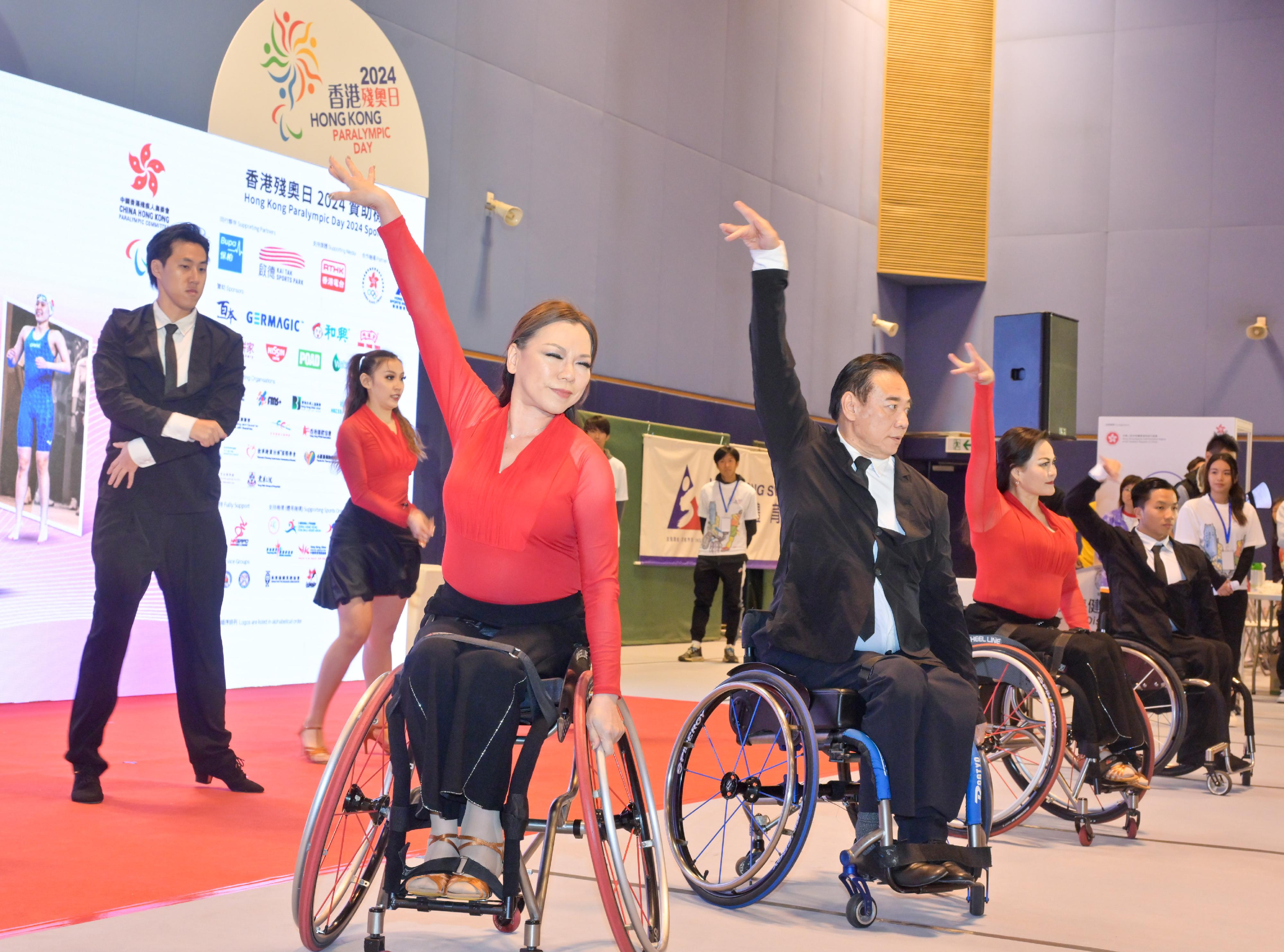 Hong Kong Paralympic Day 2024 and one-year countdown campaign of the 12th National Games for Persons with Disabilities and the 9th National Special Olympic Games (Hong Kong) was held at the Hong Kong Sports Institute today (December 8). Photo shows a para dance sport performance staged at the ceremony.