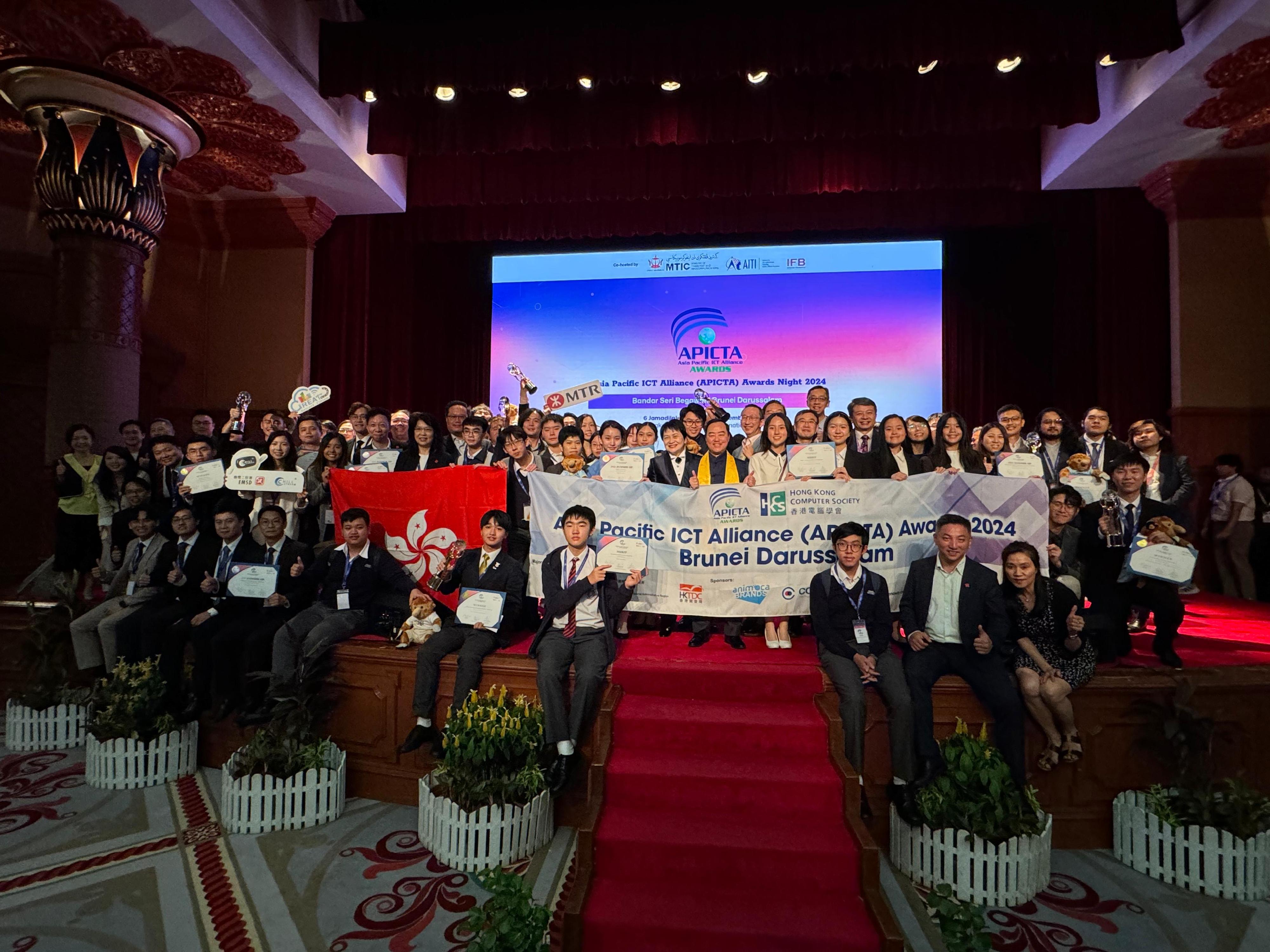 The Hong Kong delegation attained excellent results in the Asia Pacific Information and Communications Technology Alliance Awards 2024. Picture shows the Commissioner for Digital Policy, Mr Tony Wong, and the delegation in a group photo after the presentation ceremony held in Bandar Seri Begawan, Brunei on December 7.