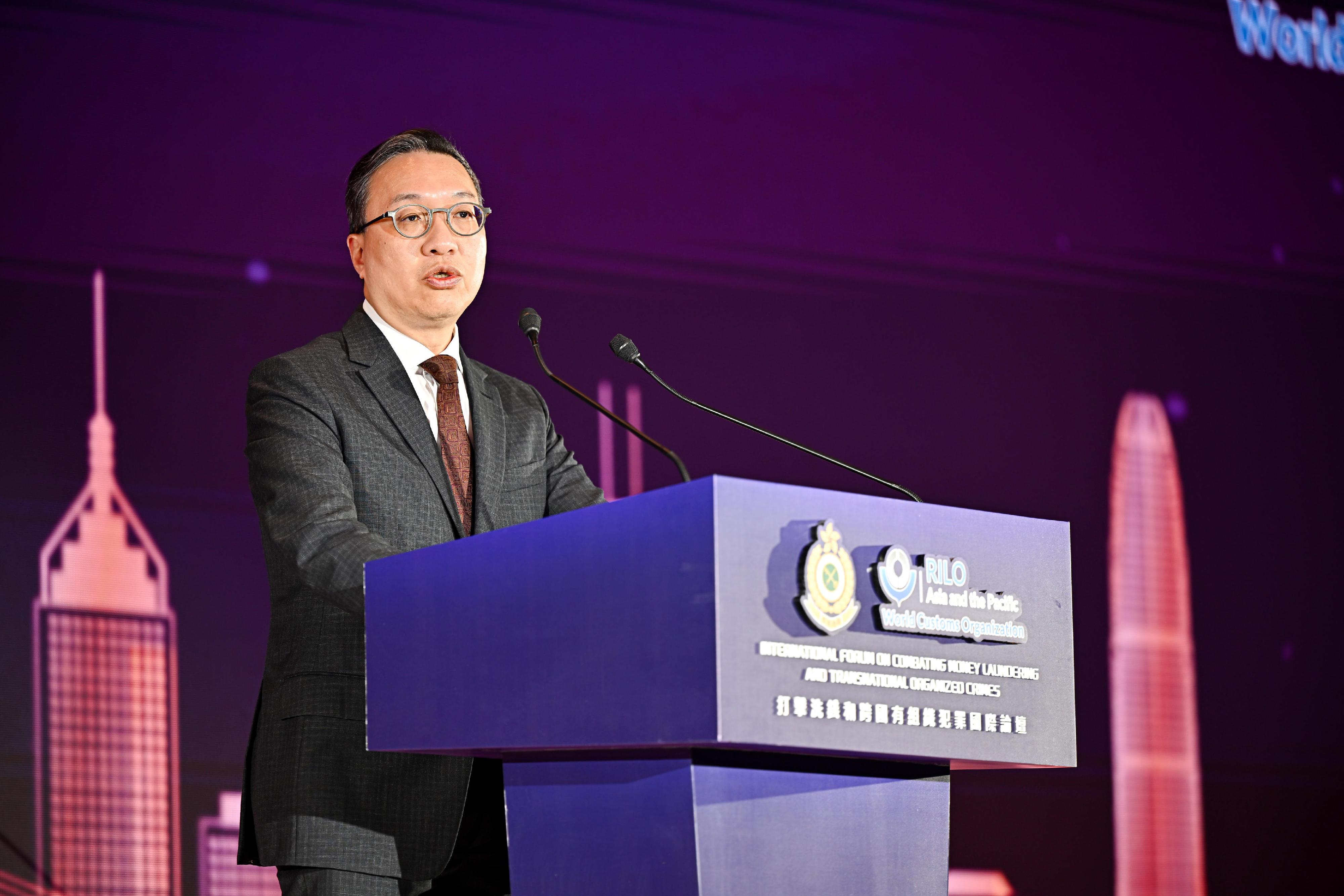 Hong Kong Customs and the Regional Intelligence Liaison Office for Asia and the Pacific today (December 10) hosted a three-day International Forum on Combating Money Laundering and Transnational Organized Crimes. Photo shows the Secretary for Justice, Mr Paul Lam, SC, delivering an opening speech at the forum.