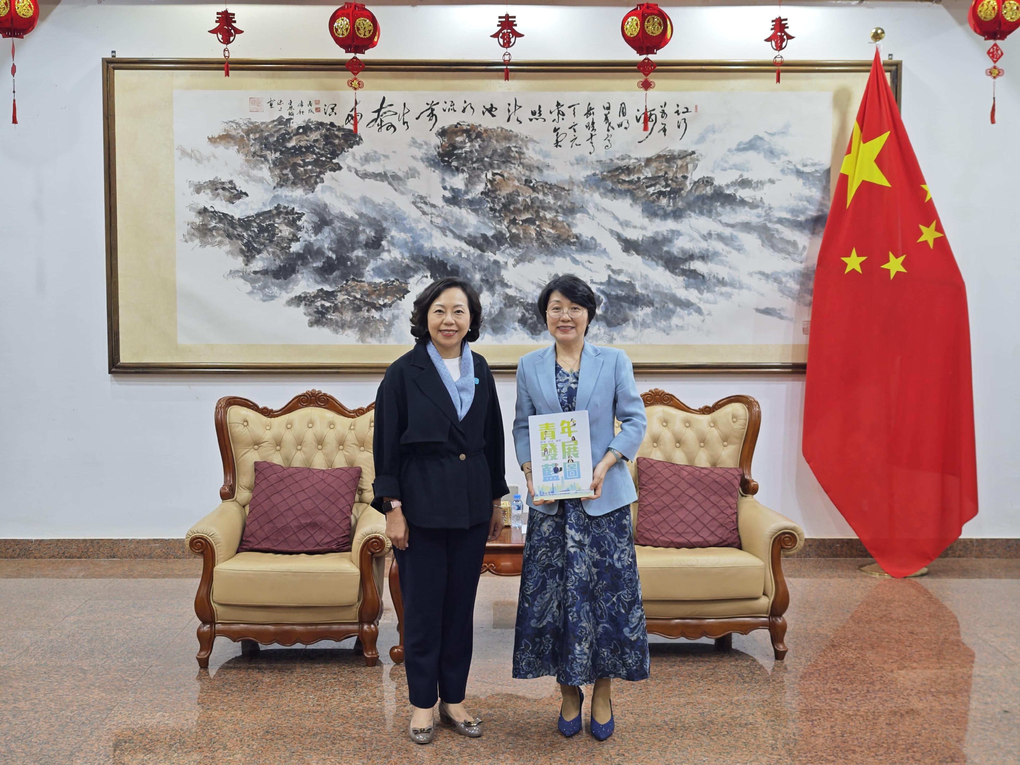 The Secretary for Home and Youth Affairs, Miss Alice Mak, commenced her visit to Laos today (December 10). Photo shows Miss Mak (left) meeting with the Ambassador Extraordinary and Plenipotentiary of the People's Republic of China to the Lao People's Democratic Republic, Ms Fang Hong (right), to exchange views on matters related to promoting youth development.

