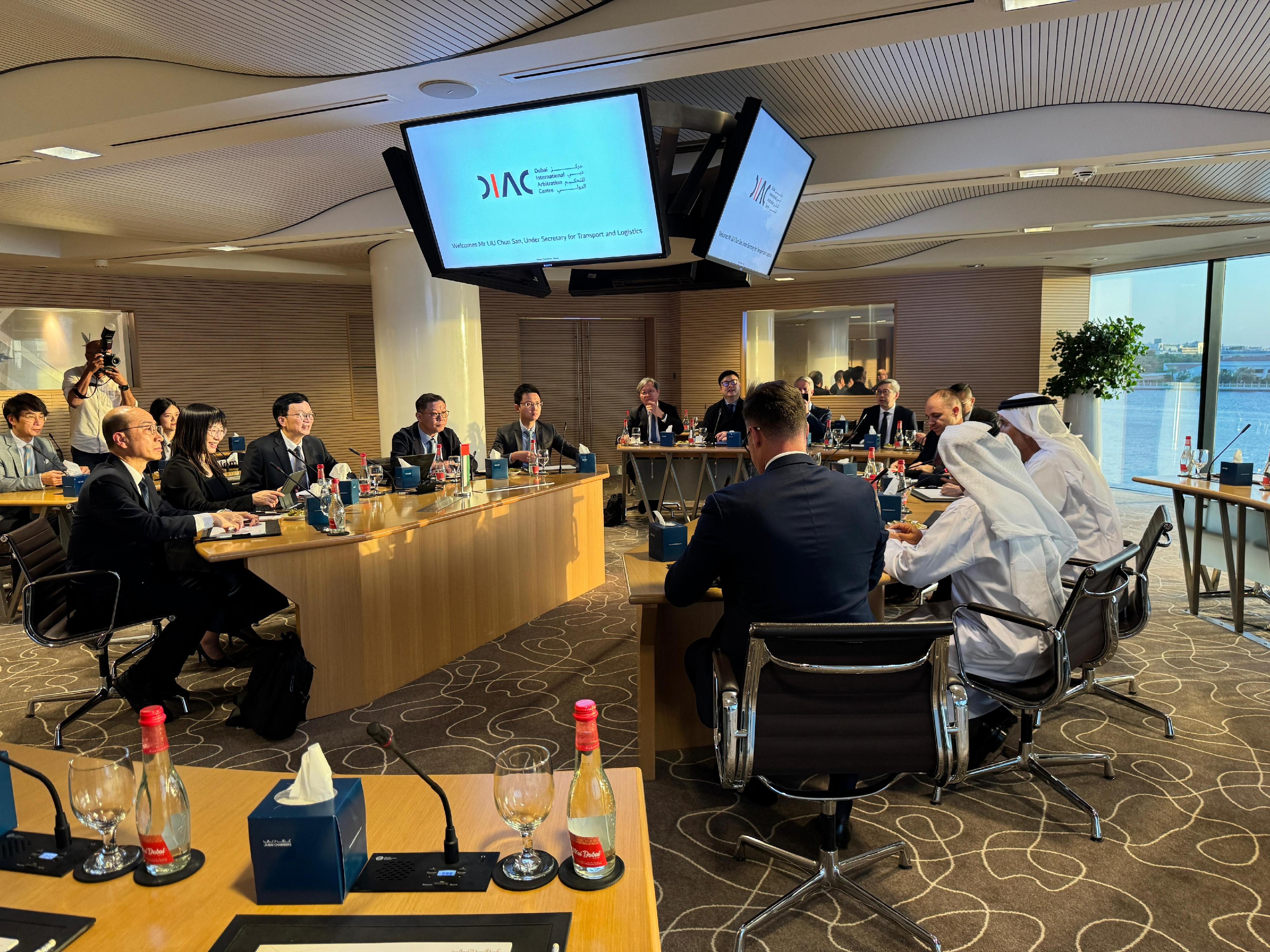 The Under Secretary for Transport and Logistics, Mr Liu Chun-san, led a delegation of over 10 members from the Hong Kong Maritime and Port Board (HKMPB) and the Hong Kong Logistics Development Council, and representatives from the Marine Department and Invest Hong Kong, for a five-day visit to Dubai and Abu Dhabi, United Arab Emirates, and Bahrain. Photo shows Mr Liu (third left), together with members of the HKMPB, meeting with representatives of the Dubai International Arbitration Centre in Dubai on December 9 (Dubai time). Deputy Secretary for Transport and Logistics Miss Amy Chan (second left) and Deputy Director of Marine Mr Shi Qiang (first left) also attended.