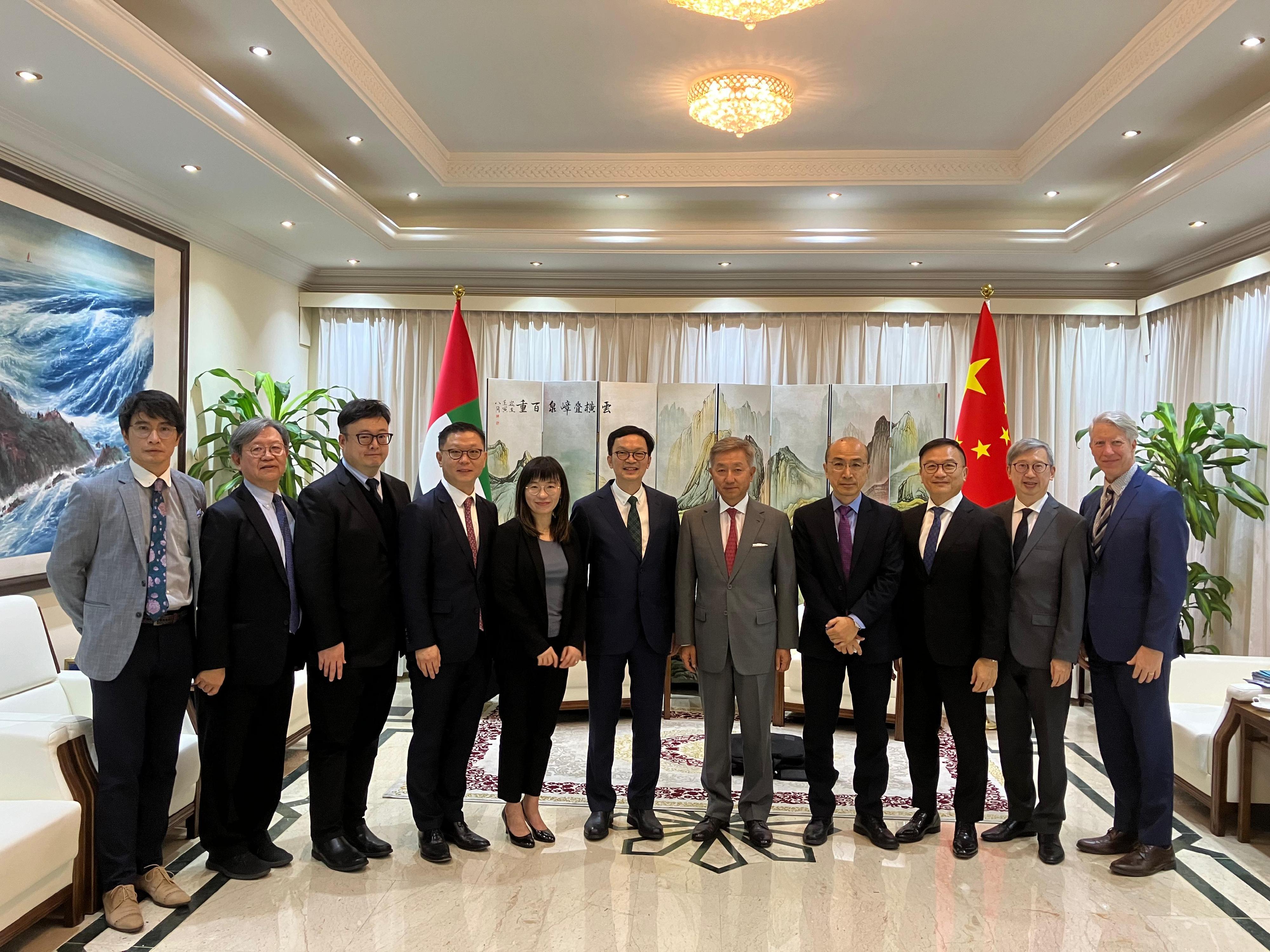 The Under Secretary for Transport and Logistics, Mr Liu Chun-san, led a delegation of over 10 members from the Hong Kong Maritime and Port Board (HKMPB) and the Hong Kong Logistics Development Council, and representatives from the Marine Department and Invest Hong Kong, for a five-day visit to Dubai and Abu Dhabi, United Arab Emirates (UAE), and Bahrain. Photo shows Mr Liu (centre), Deputy Secretary for Transport and Logistics Miss Amy Chan (fifth left), Deputy Director of Marine Mr Shi Qiang (fourth right), and members of the HKMPB with the Ambassador Extraordinary and Plenipotentiary of the People’s Republic of China to the UAE, Mr Zhang Yiming (fifth right), after a call in Abu Dhabi on December 10 (Abu Dhabi time). 