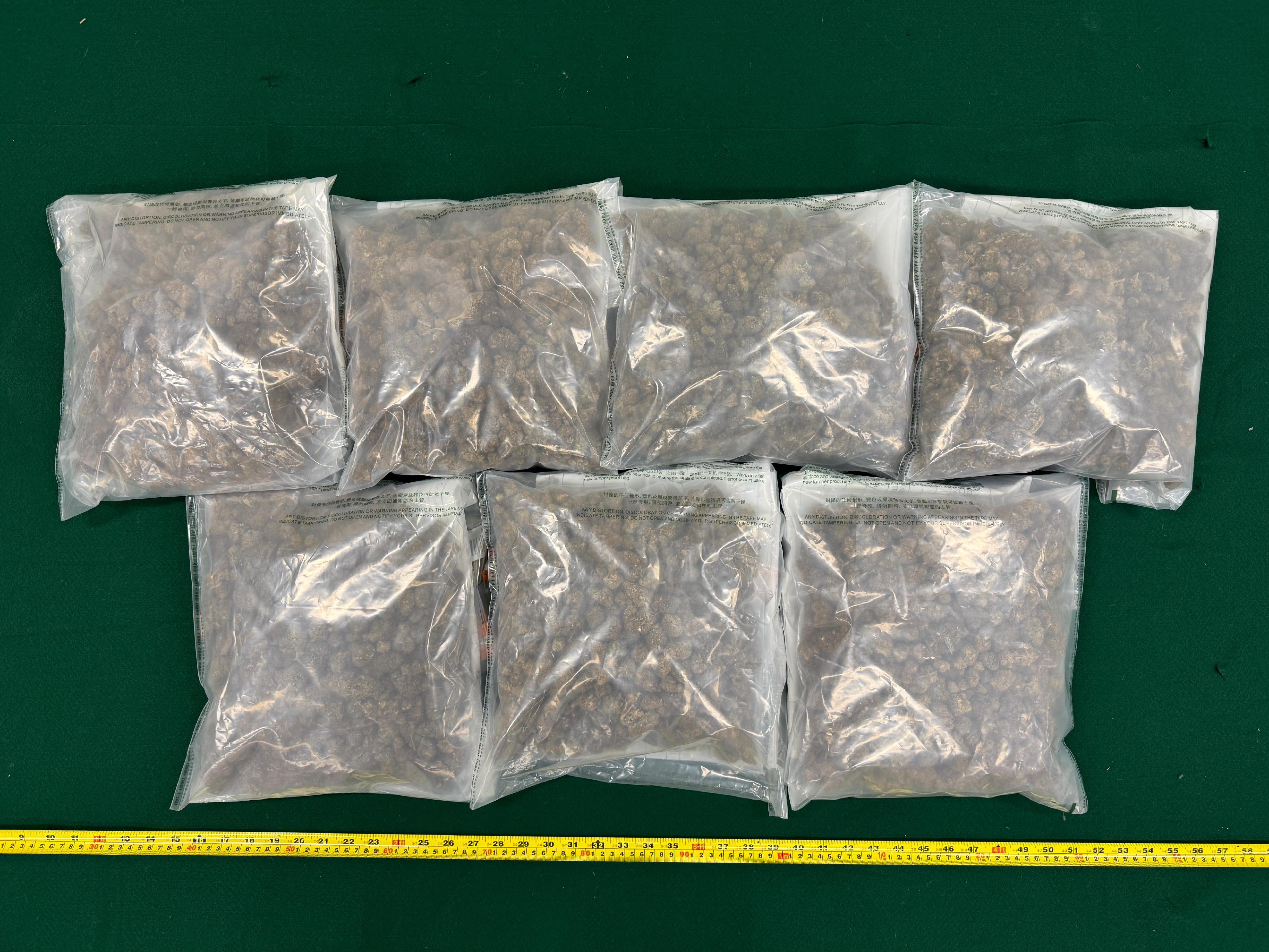 Hong Kong Customs detected three dangerous drugs cases in Tsuen Wan, Yuen Long; Yau Tong; and Hong Kong International Airport yesterday (December 10). Photo shows suspected cannabis buds seized in the second case.