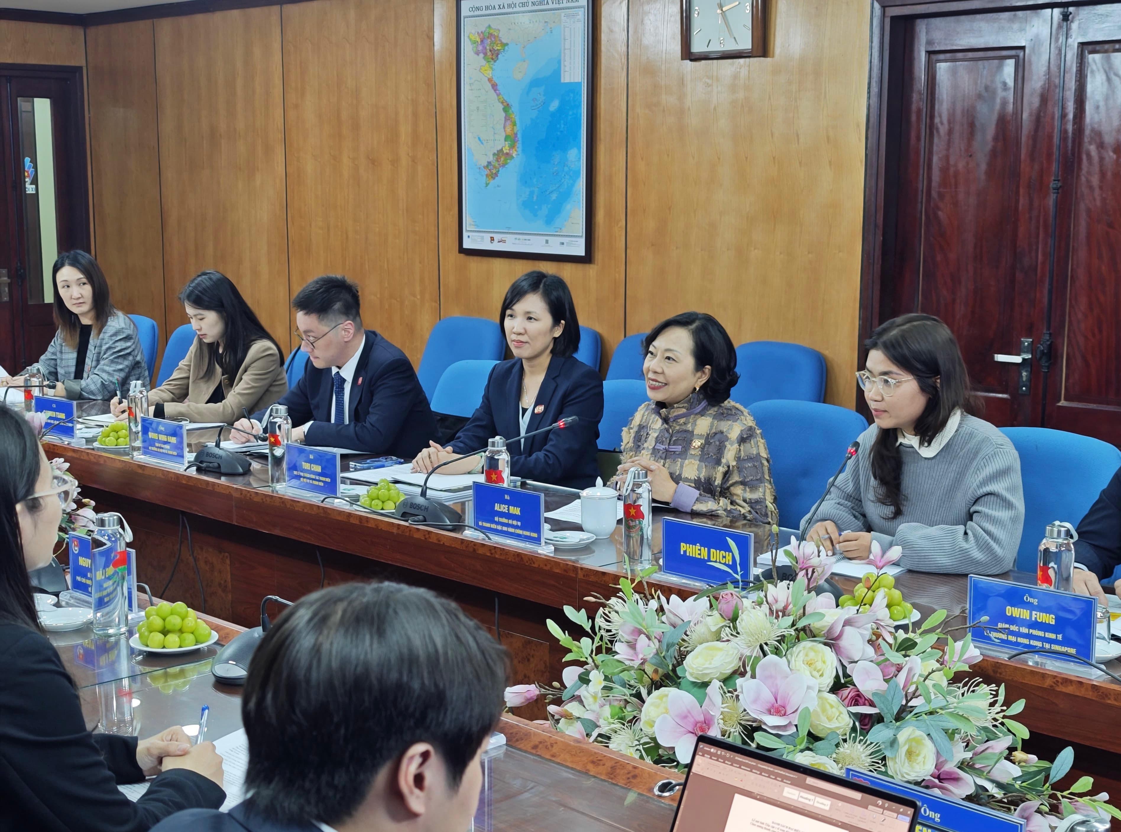 The Secretary for Home and Youth Affairs, Miss Alice Mak, continued her visit in Vietnam today (December 12). Photo shows Miss Mak (second right) speaking at a meeting with the Secretary of Ho Chi Minh Communist Youth Union's Central Committee, Mr Nguyen Tuong Lam.