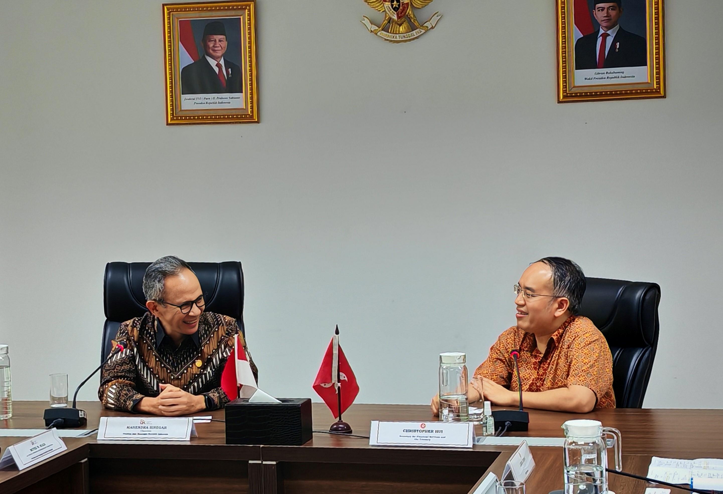 The Secretary for Financial Services and the Treasury, Mr Christopher Hui, concluded his visit to Jakarta, Indonesia, today (December 13). Photo shows Mr Hui (right) meeting the Chairman of the Board of Commissioners of Financial Services Authority of Indonesia, Mr Mahendra Siregar (left), this morning to share insights on boosting the development of virtual assets and other new financial products.