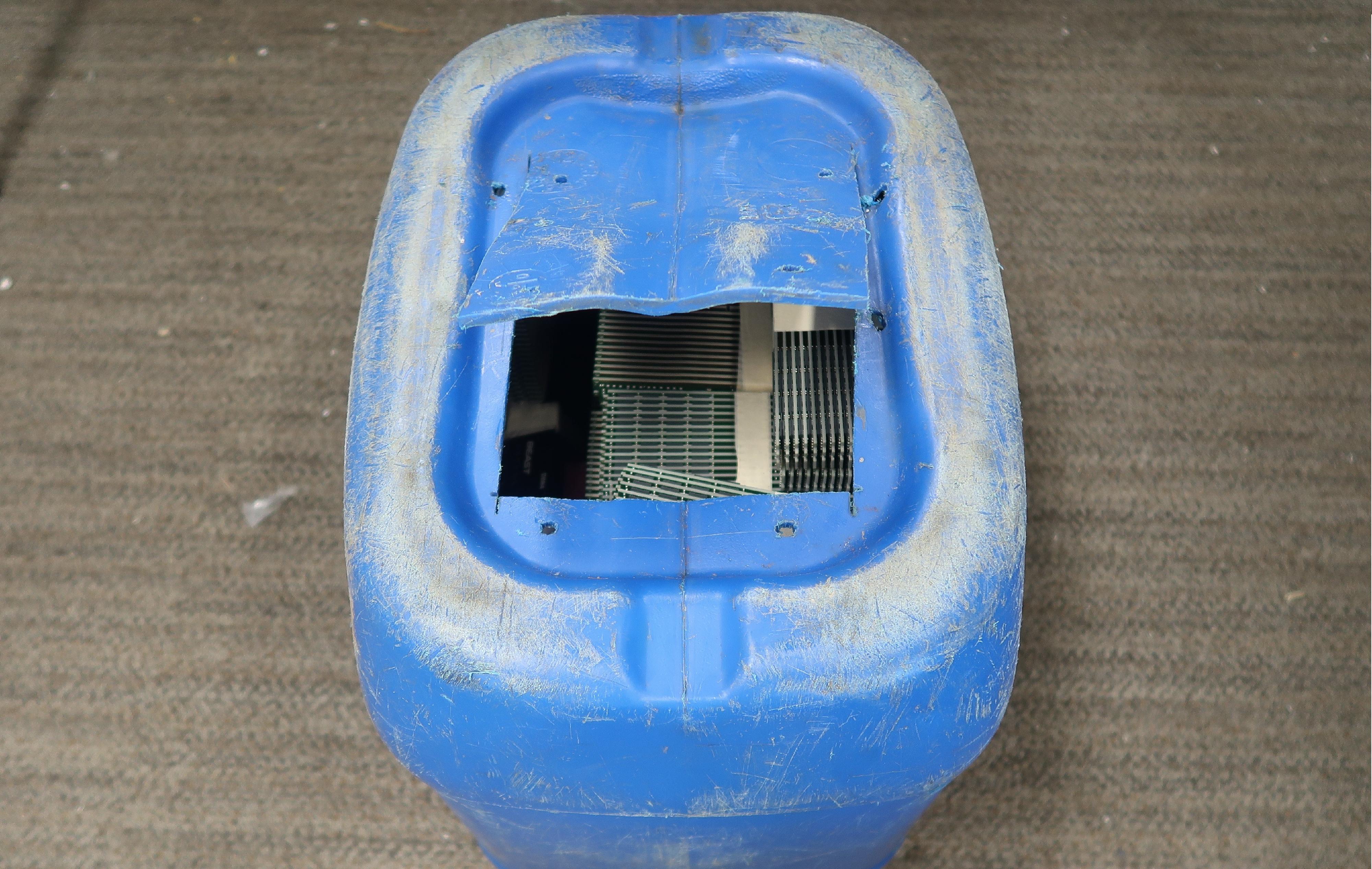 Hong Kong Customs on December 4 detected a suspected smuggling case involving a speedboat in the vicinity of Lau Fau Shan, Yuen Long. A batch of suspected smuggled goods, with an estimated market value of about $6.9 million, was seized. Photo shows a jerry can with an altered structure that was filled with suspected smuggled goods.