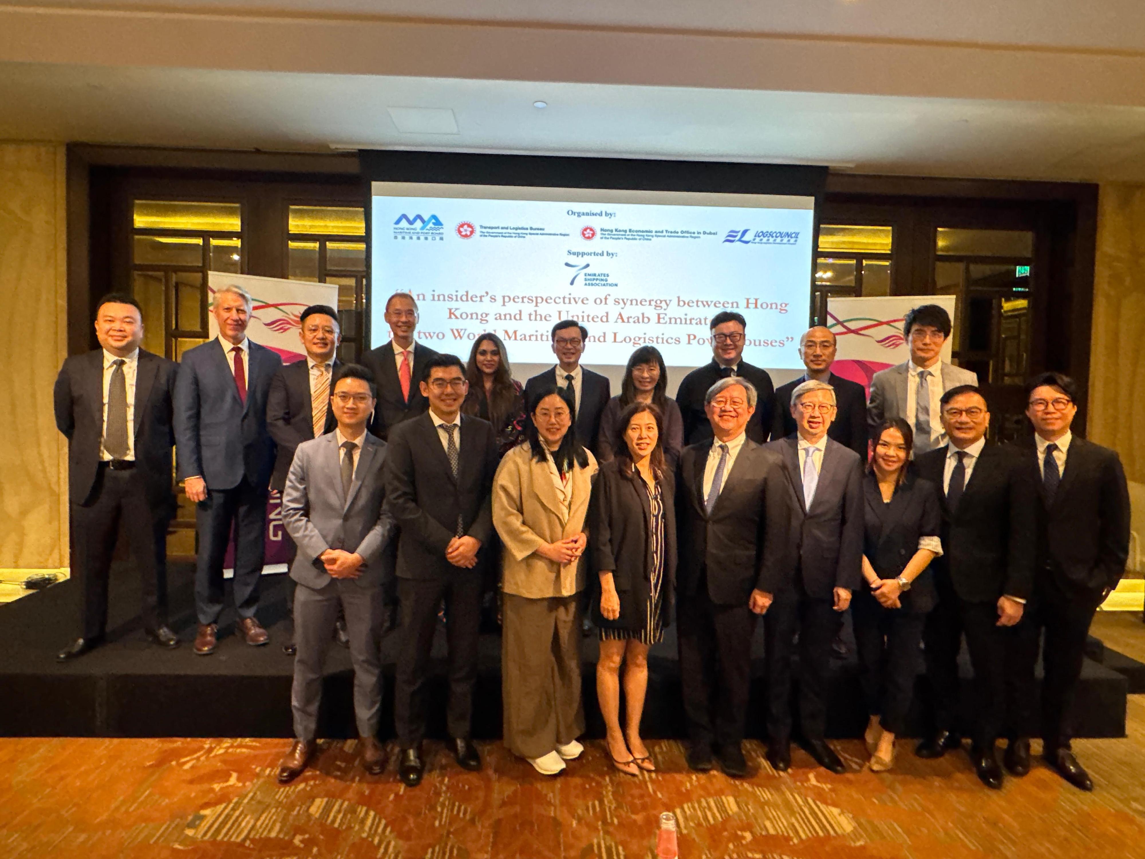 The Under Secretary for Transport and Logistics, Mr Liu Chun-san, led a delegation of over 10 members from the Hong Kong Maritime and Port Board (HKMPB) and the Hong Kong Logistics Development Council, and representatives from the Marine Department and Invest Hong Kong, for a five-day visit to Dubai and Abu Dhabi, United Arab Emirates, and Bahrain. Photo shows Mr Liu (back row, fifth right), Deputy Secretary for Transport and Logistics Miss Amy Chan (back row, fourth right), Deputy Director of Marine, Mr Shi Qiang (back row, second right), and Director-General of the Hong Kong Economic and Trade Office in Dubai (Dubai ETO), Mr Damian Lee (back row, third left), together with members of the delegation and the general manager of Emirates Shipping Association, Ms Huma Qureshi (back row, fifth left), at a seminar on maritime and logistics hosted by the Dubai ETO today (December 11, Dubai time).