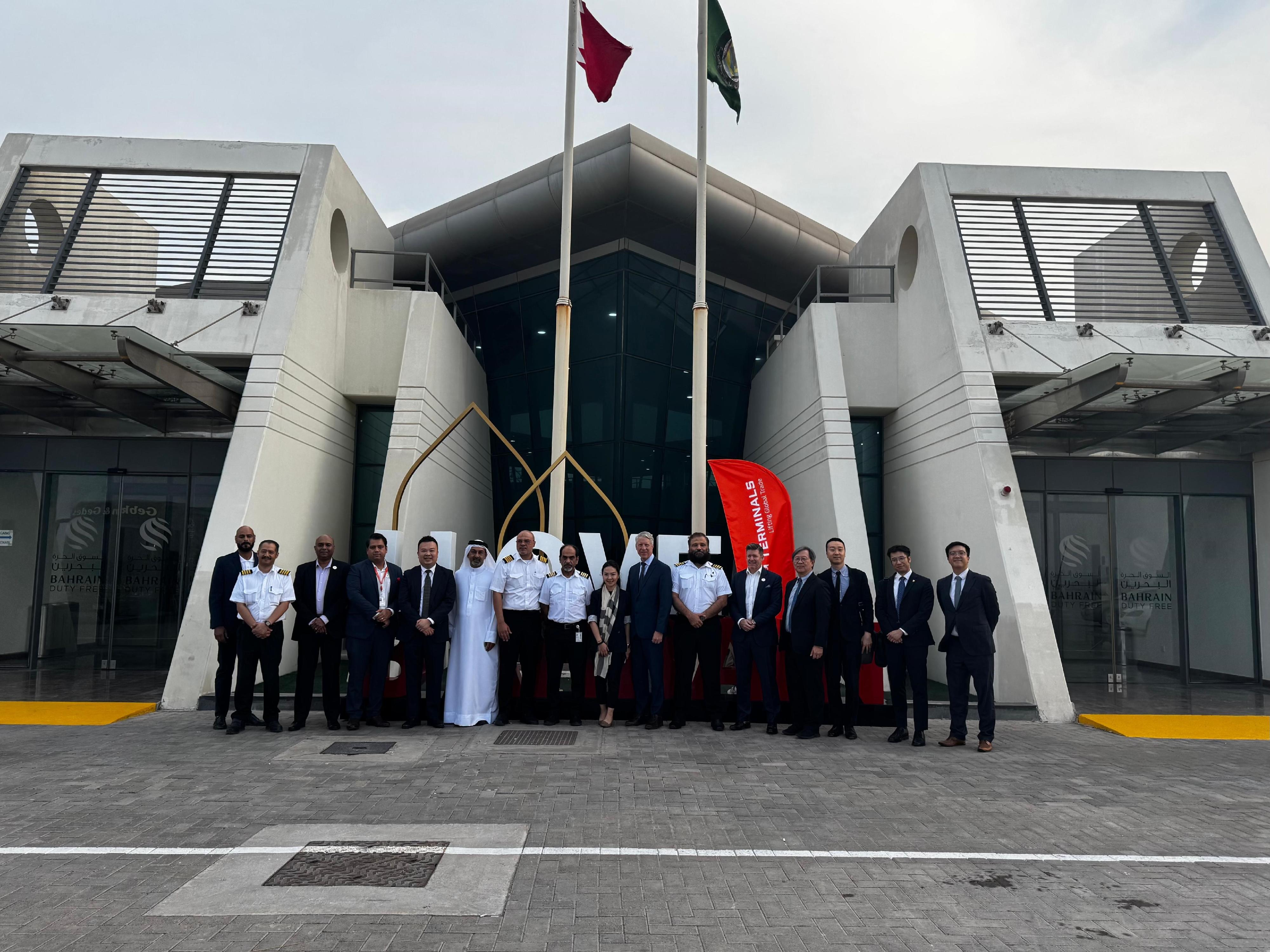 The Under Secretary for Transport and Logistics, Mr Liu Chun-san, led a delegation of over 10 members from the Hong Kong Maritime and Port Board and the Hong Kong Logistics Development Council, and representatives from the Marine Department and Invest Hong Kong, for a five-day visit to Dubai and Abu Dhabi, United Arab Emirates, and Bahrain. Photo shows representatives of the Transport and Logistics Bureau, together with members of the Hong Kong Logistics Development Council, visiting the Khalifa Bin Salman Port in Bahrain on December 12 (Bahrain time) to learn about their port operation.