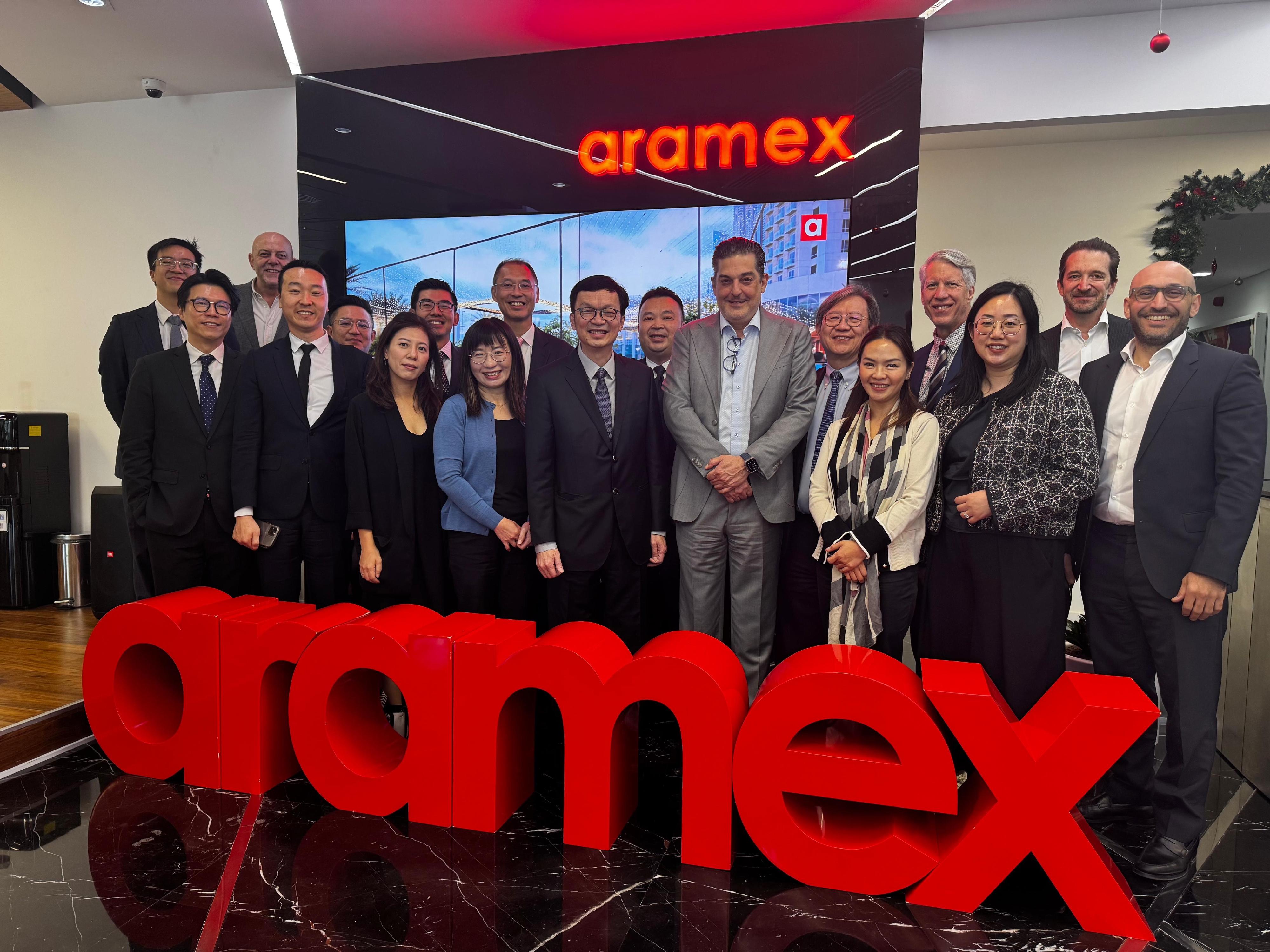 The Under Secretary for Transport and Logistics, Mr Liu Chun-san, led a delegation of over 10 members from the Hong Kong Maritime and Port Board and the Hong Kong Logistics Development Council, and representatives from the Marine Department and Invest Hong Kong, for a five-day visit to Dubai and Abu Dhabi, United Arab Emirates, and Bahrain. Mr Liu (front row, centre), Deputy Secretary for Transport and Logistics Miss Amy Chan (fourth left) and members of the Hong Kong Logistics Development Council, visited a global logistics and transportation enterprise in Dubai on December 13 (Dubai time), which already investing in Hong Kong, to learn about its development and discuss how Hong Kong can better facilitate its business development in East Asia.