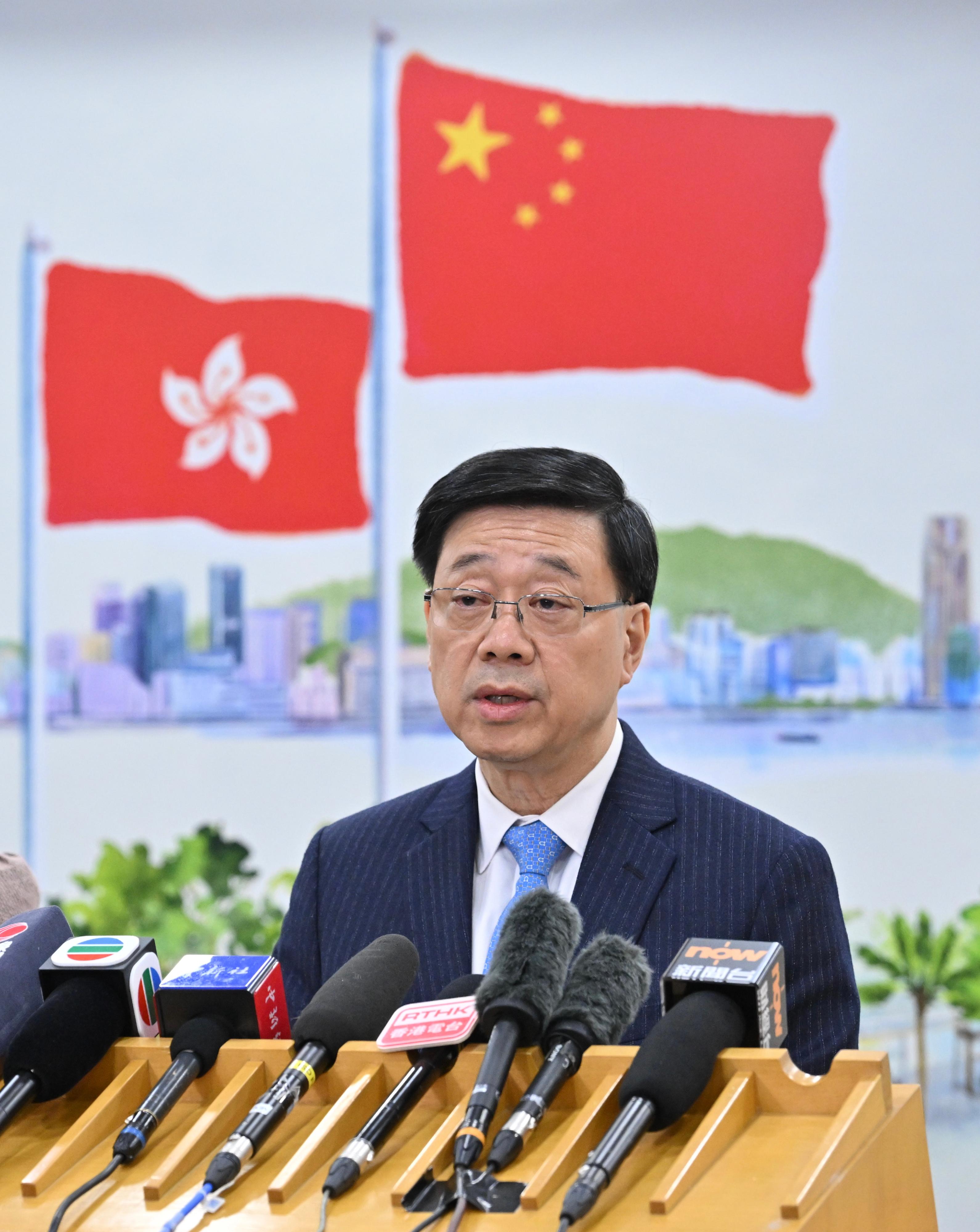 The Chief Executive, Mr John Lee, meets the media in Beijing after reporting to President Xi Jinping on work today (December 13).