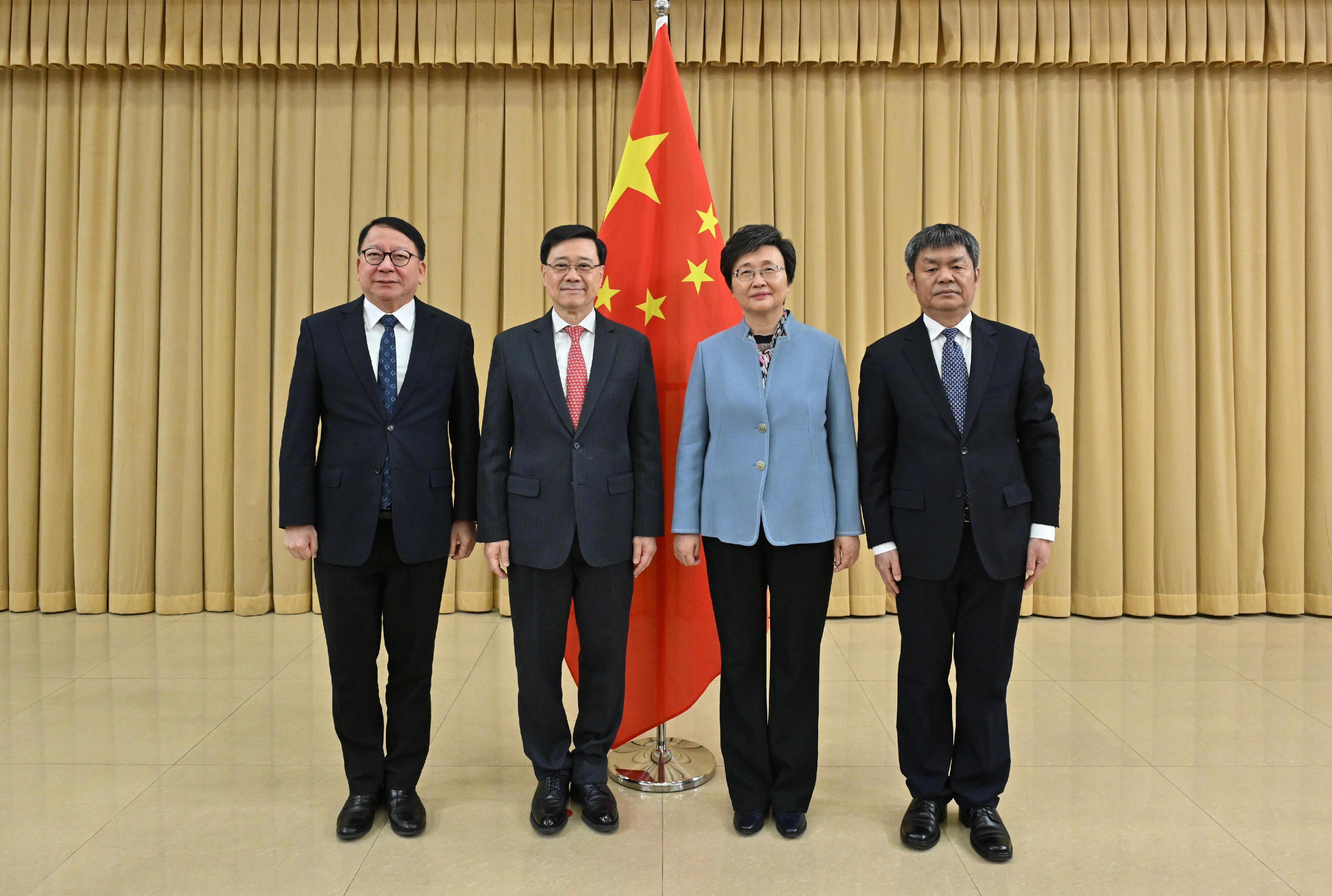 The Chief Executive, Mr John Lee, called on the Ministry of Human Resources and Social Security in Beijing today (December 14). Photo shows (from left) the Chief Secretary for Administration, Mr Chan Kwok-ki; Mr Lee; the Minister of Human Resources and Social Security, Ms Wang Xiaoping; and Vice Minister of Human Resources and Social Security Mr Wu Xiuzhang. 