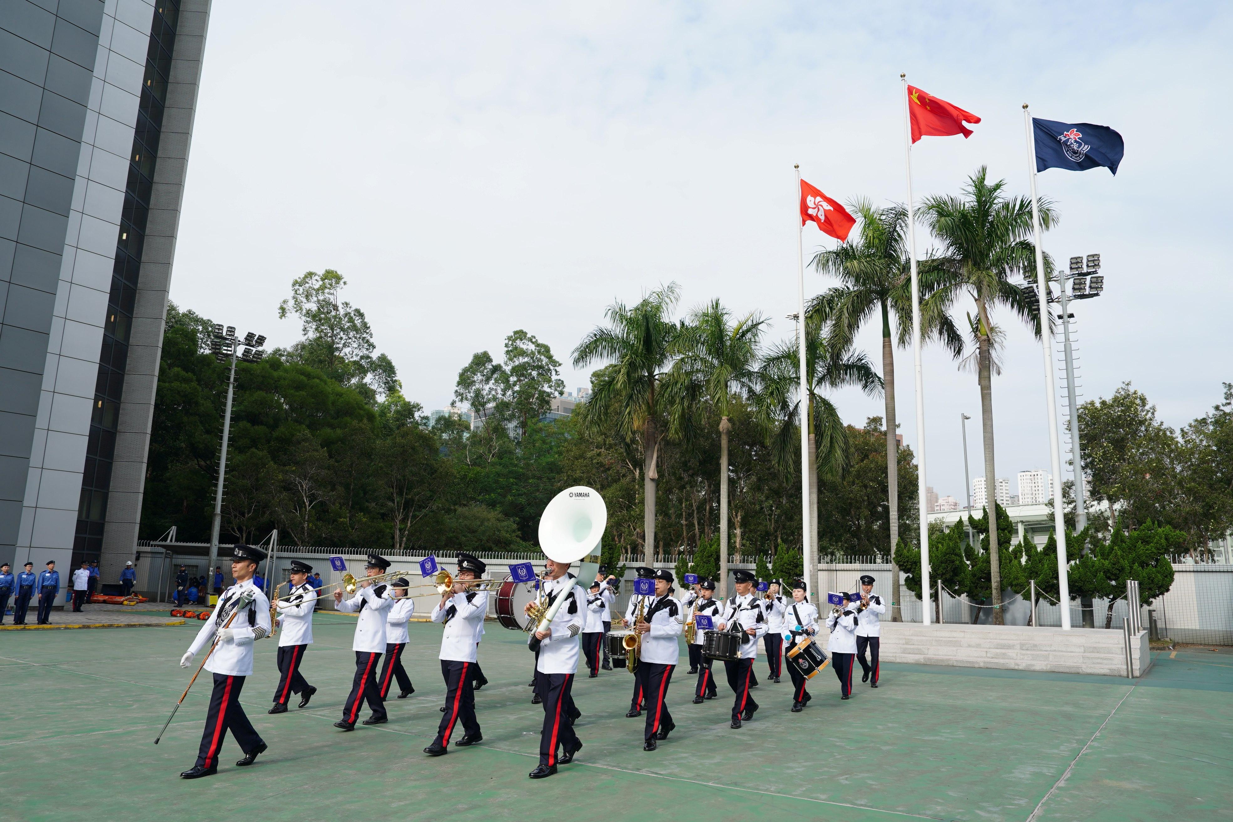 The Civil Aid Service (CAS) held the 89th Recruits Passing-out Parade at its headquarters today (December 15). Photo shows the CAS Band performing.