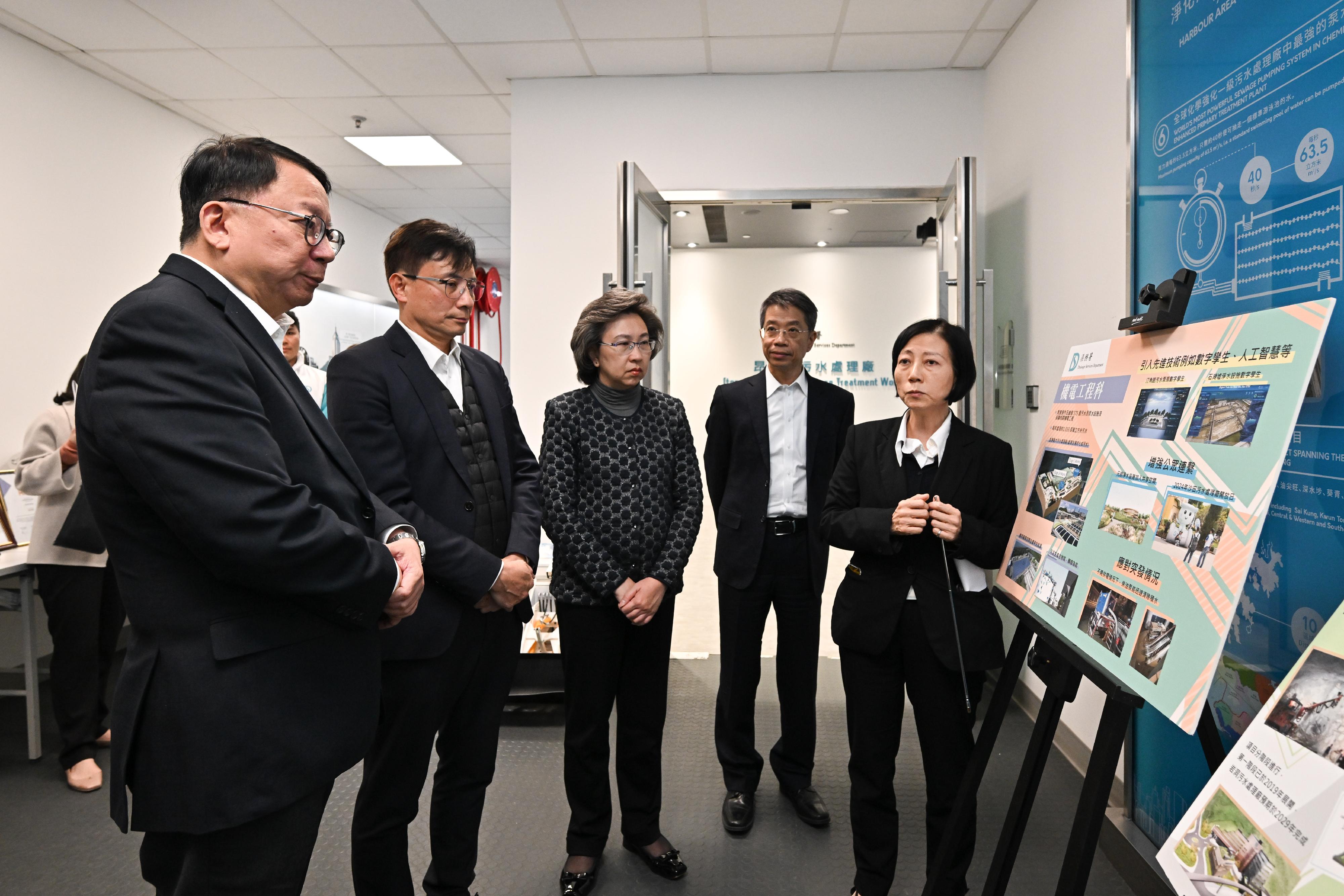 The Chief Secretary for Administration, Mr Chan Kwok-ki, and the Secretary for the Civil Service, Mrs Ingrid Yeung, visited the Drainage Services Department this afternoon (December 16) to learn more about the department's daily operations and the latest progress on its drainage improvement works. They also toured the Stonecutters Island Sewage Treatment Works, which is the largest of its type in Hong Kong. Photo shows Mr Chan (first left) and Mrs Yeung (centre) briefed by the Assistant Director of the Drainage Services Department (Electrical and Mechanical), Ms Sussana Lai (first right), on the work of the Electrical and Mechanical Branch. Looking on are the Permanent Secretary for the Civil Service, Mr Clement Leung (second right), and the Director of Drainage Services, Mr Ringo Mok (second left).