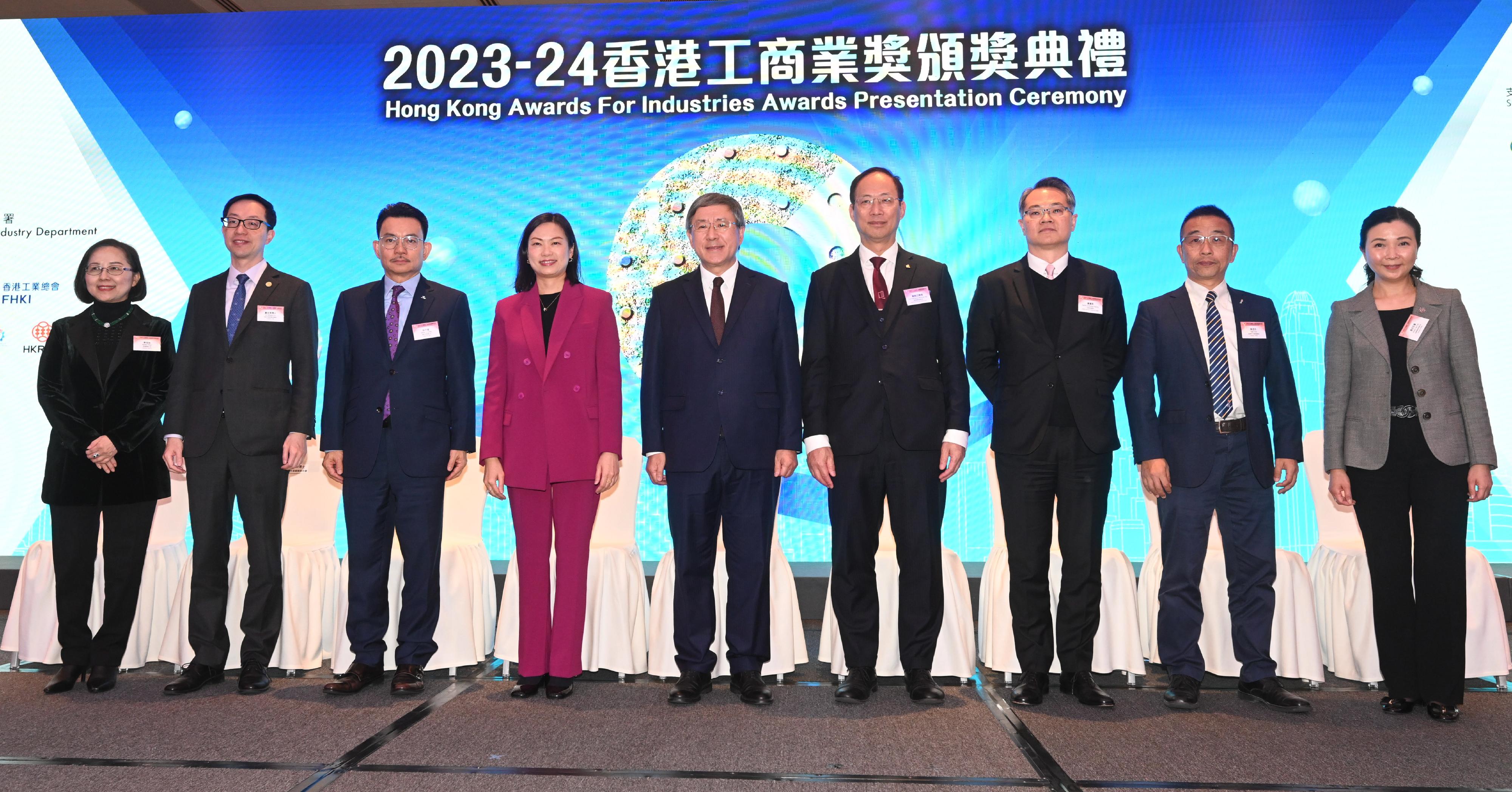 To commend 79 local companies for their outstanding achievements, the 2023-24 Hong Kong Awards for Industries (HKAI) Presentation Ceremony was held today (December 16) at the Hong Kong Convention and Exhibition Centre. Photo shows (from left) the Chairman of the Hong Kong General Chamber of Commerce, Ms Agnes Chan; the President of the Chinese Manufacturers' Association of Hong Kong, Dr Wingco Lo; the Chairman of the Federation of Hong Kong Industries, Mr Steve Chuang; the Permanent Secretary for Commerce and Economic Development, Ms Maggie Wong; the Deputy Chief Secretary for Administration, Mr Cheuk Wing-hing; the Chairman of the final judging panels of the HKAI, Professor Alexander Wai Ping-kong; the Director-General of Trade and Industry, Mr Aaron Liu; the President of the Hong Kong Young Industrialists Council, Mr Felix Choi; and the Chairman of the Hong Kong Retail Management Association, Mrs Annie Tse, at the ceremony.