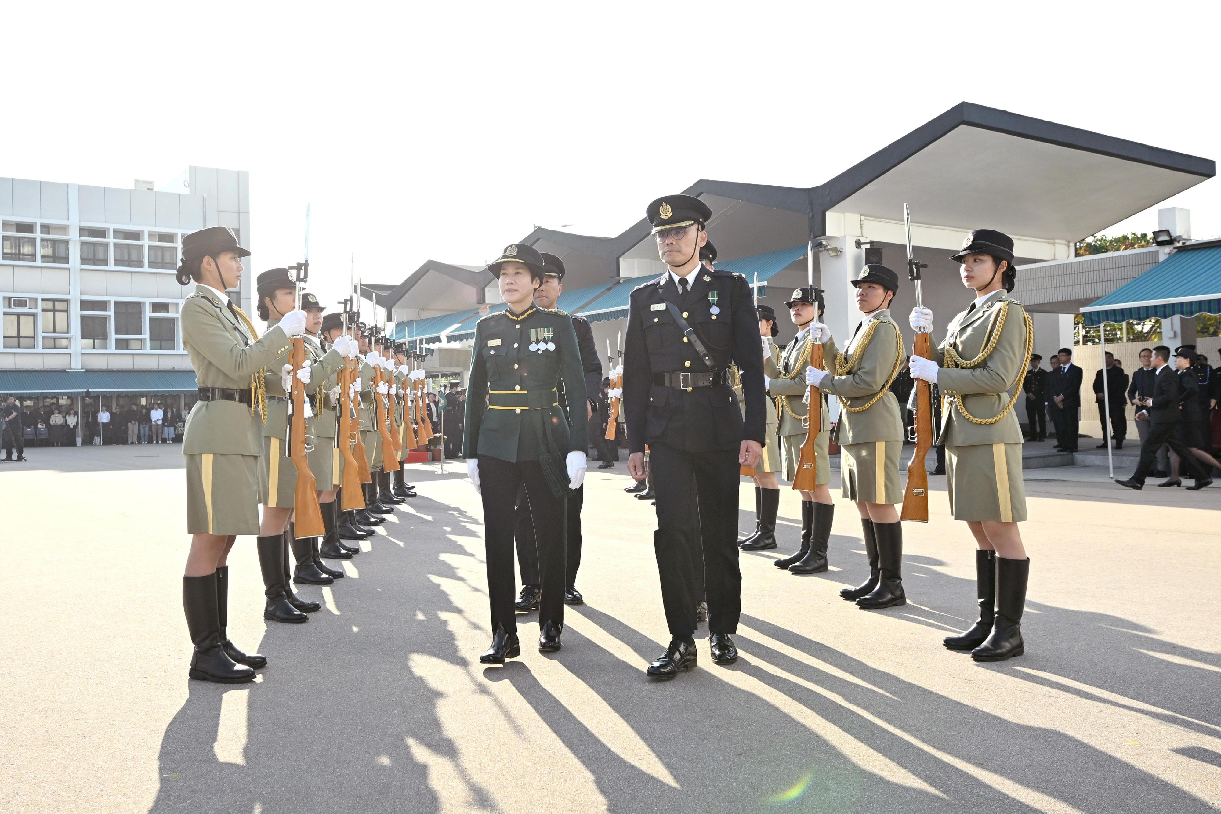 Hong Kong Customs Passing-out Parade was held today (December 17). Photo shows the Commissioner of Customs and Excise, Ms Louise Ho, inspecting the Customs and Excise Department Guards of Honour.