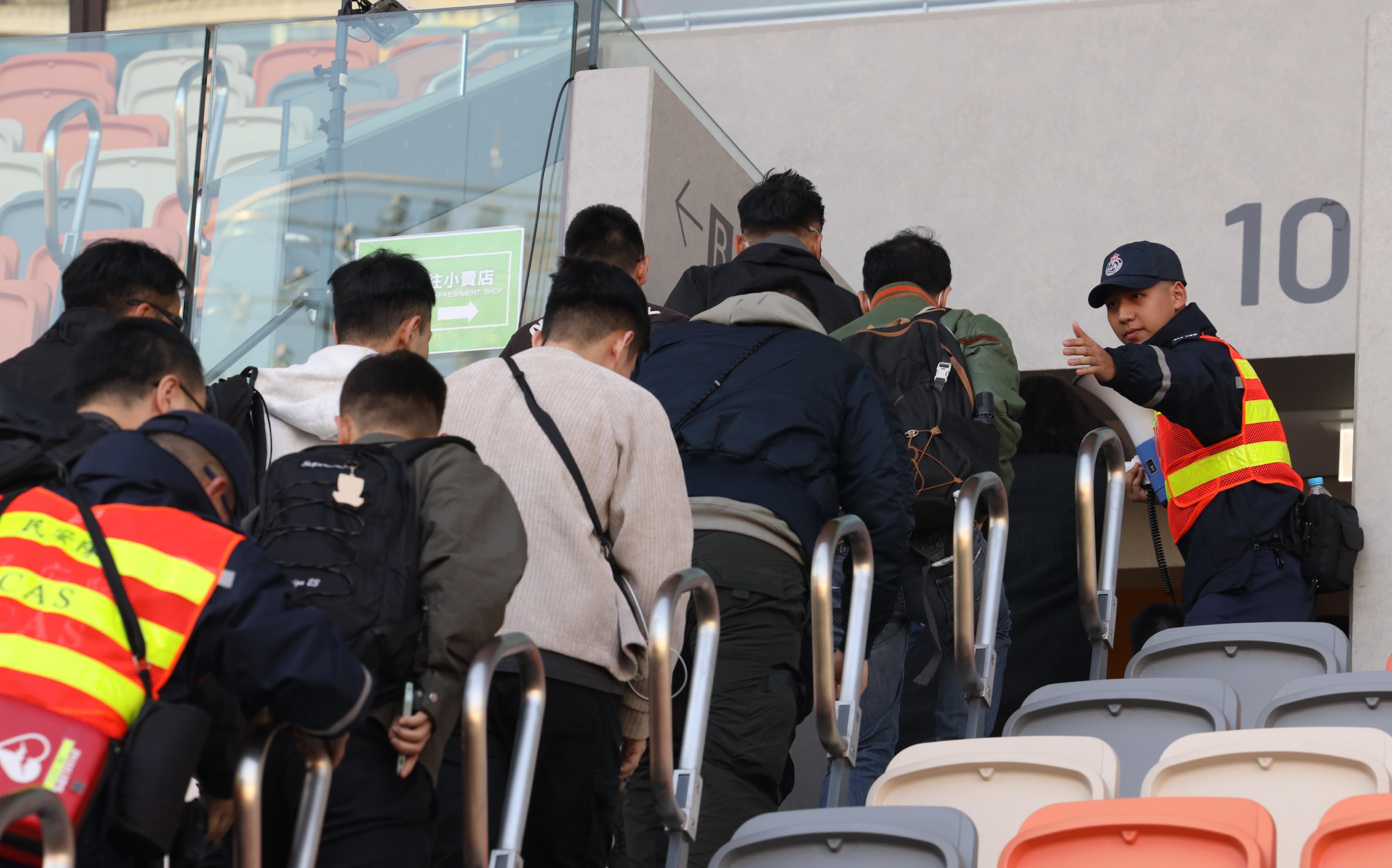 The Inter-departmental Counter Terrorism Unit (ICTU) conducted an inter-departmental counter-terrorism exercise, codenamed “WISDOMLIGHT”, at the Kai Tak Youth Sports Ground this afternoon (December 17). Photo shows an emergency evacuation drill at the Kai Tak Youth Sports Ground.