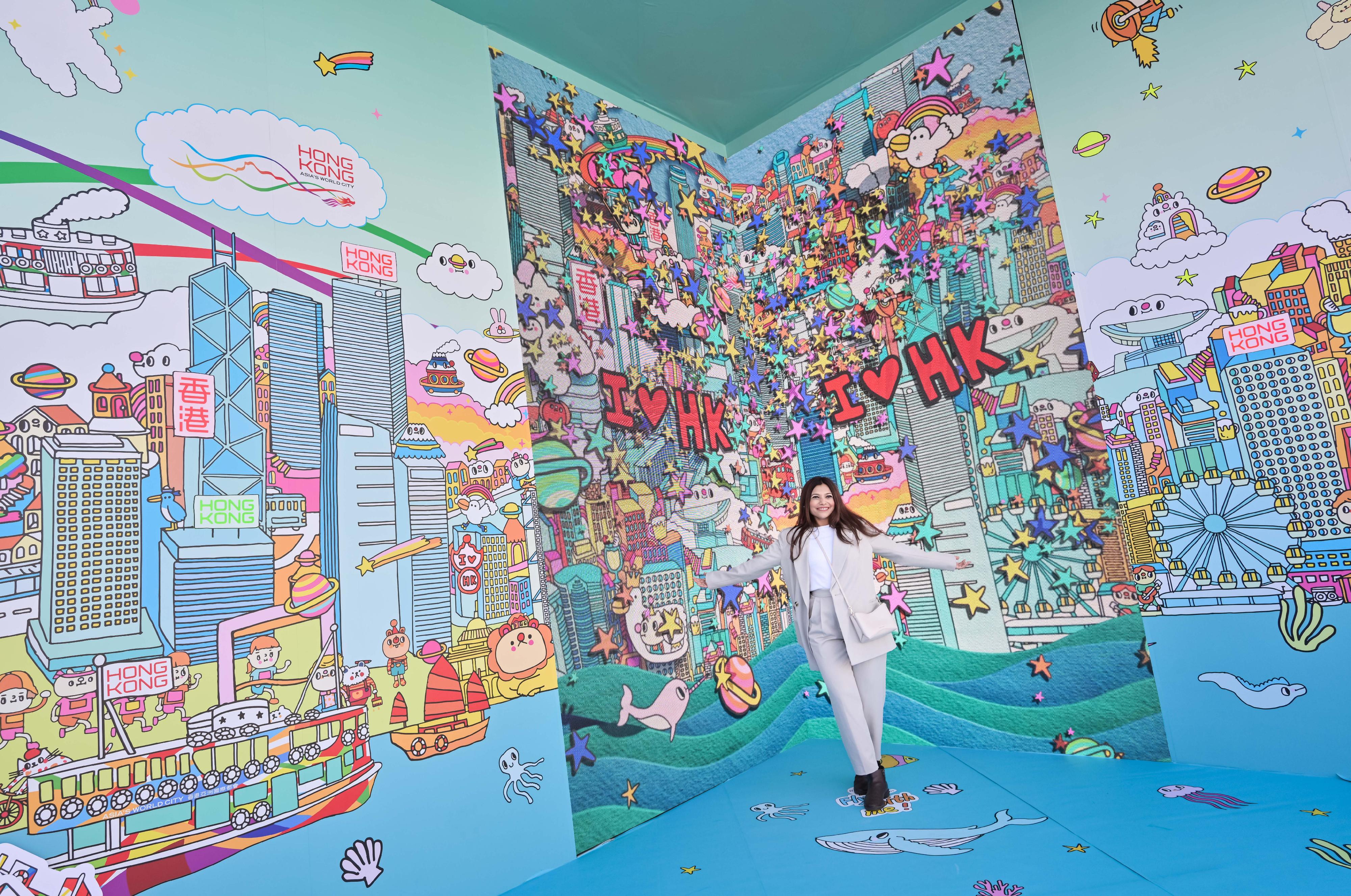 The "Immersive Hong Kong" roving exhibition, which showcases Hong Kong's new attractions, advantages and opportunities with art technology, opened in Dubai, the United Arab Emirates, today (December 20) as part of a promotional campaign organised by the Information Services Department of the Hong Kong Special Administrative Region Government. Photo shows a photo corner featuring the illustration works of Hong Kong artist Messy Desk (Jane Lee) at the exhibition.