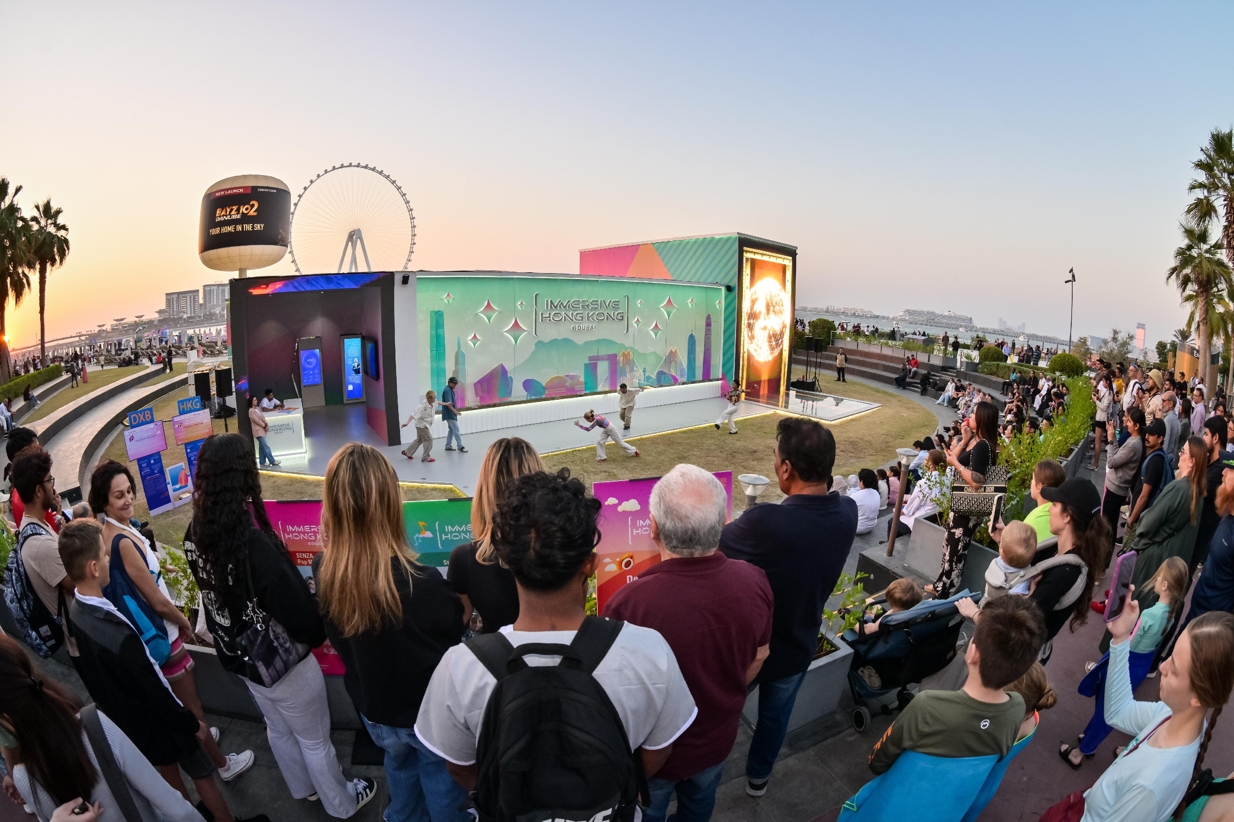 The "Immersive Hong Kong" roving exhibition, which showcases Hong Kong's new attractions, advantages and opportunities with art technology, opened in Dubai, the United Arab Emirates, today (December 20) as part of a promotional campaign organised by the Information Services Department of the Hong Kong Special Administrative Region Government. Photo shows a street dance performance by Hong Kong dance group Move Beyond at the exhibition venue.