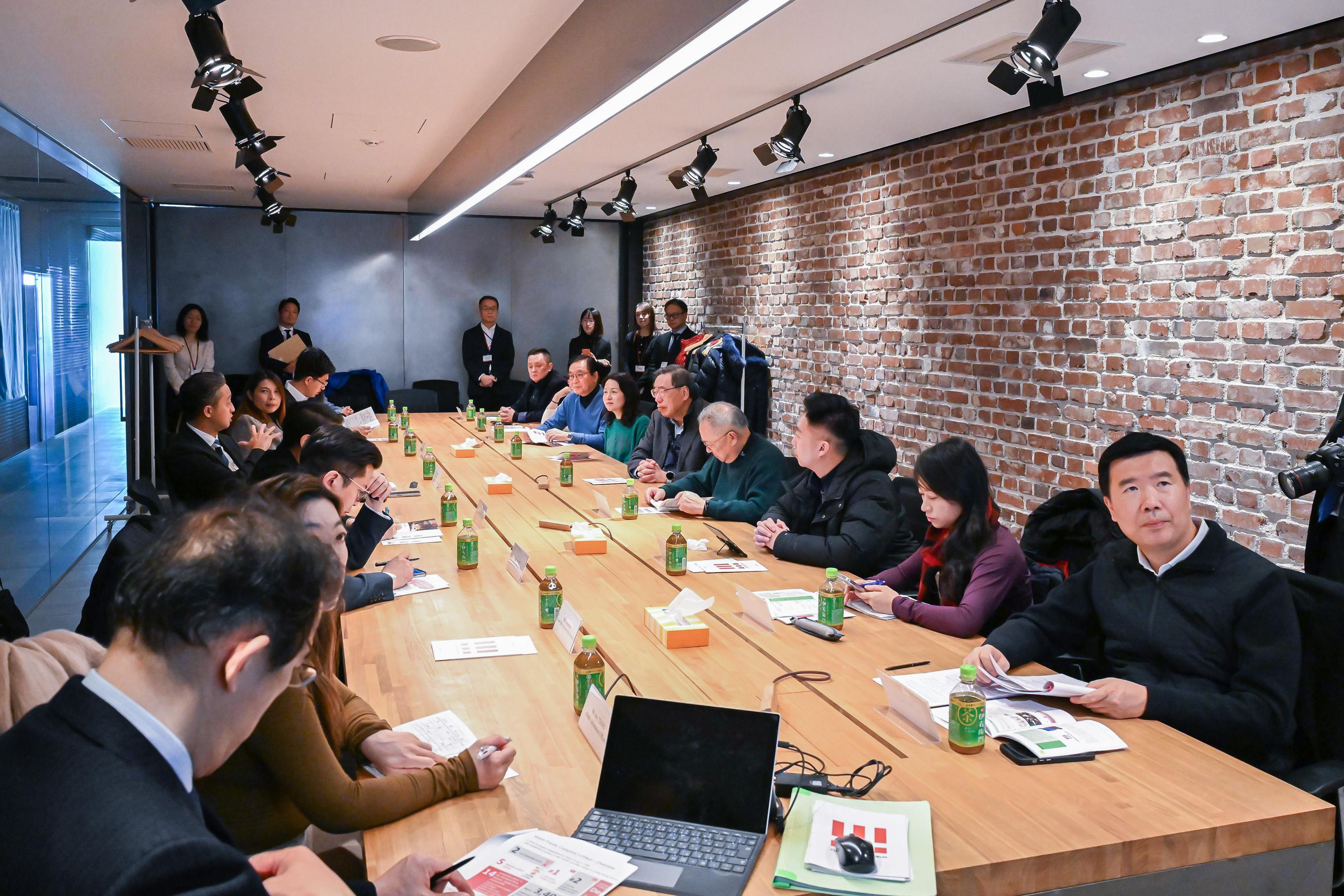 The Legislative Council (LegCo) delegation led by the President of LegCo, Mr Andrew Leung, continues its duty visit to Japan today (December 22). Photo shows the delegation receiving a briefing by representatives of the Nissin Foods Company Limited on the latest business development of the company.