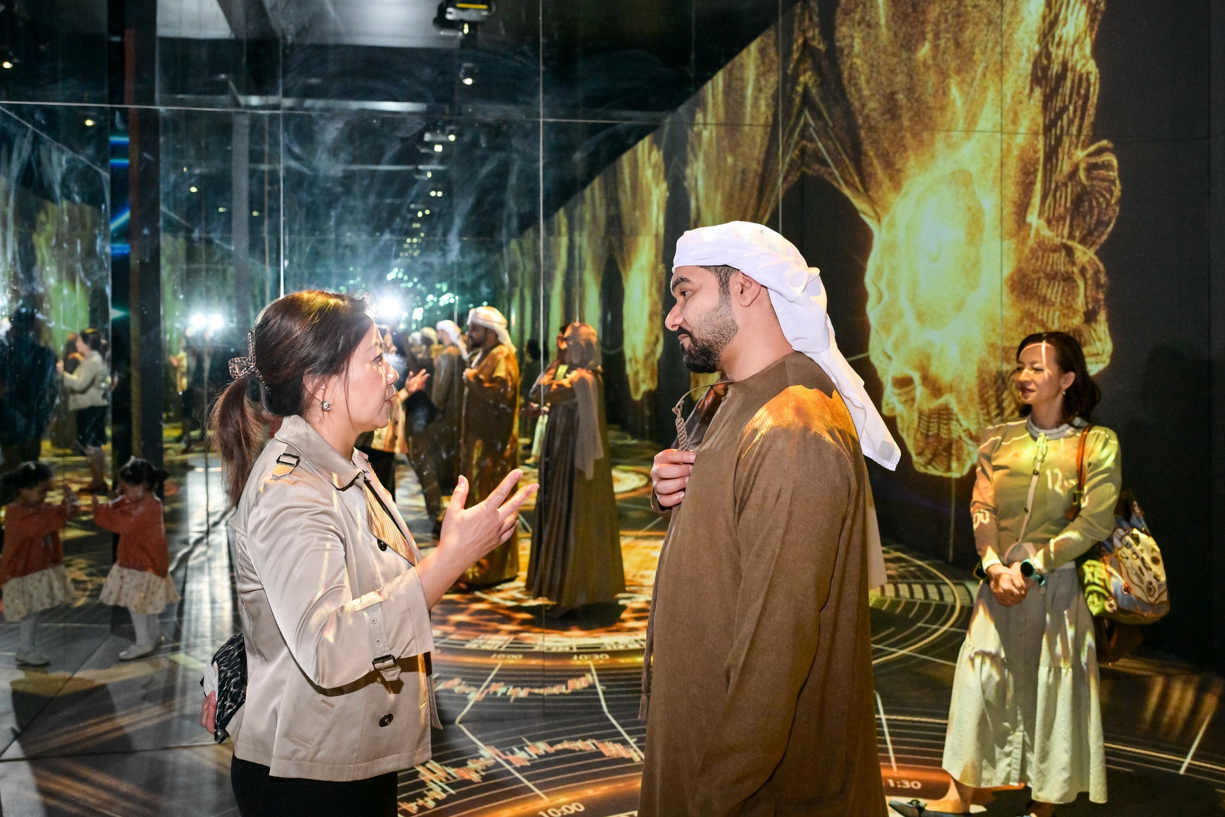 The "Immersive Hong Kong" roving exhibition is now being held in Dubai, the United Arab Emirates (UAE). Photo shows the Consul General of the UAE in Hong Kong, His Excellency Shaikh Saoud Ali M. A. Almualla (centre), receiving a briefing about the exhibition during his earlier visit.  