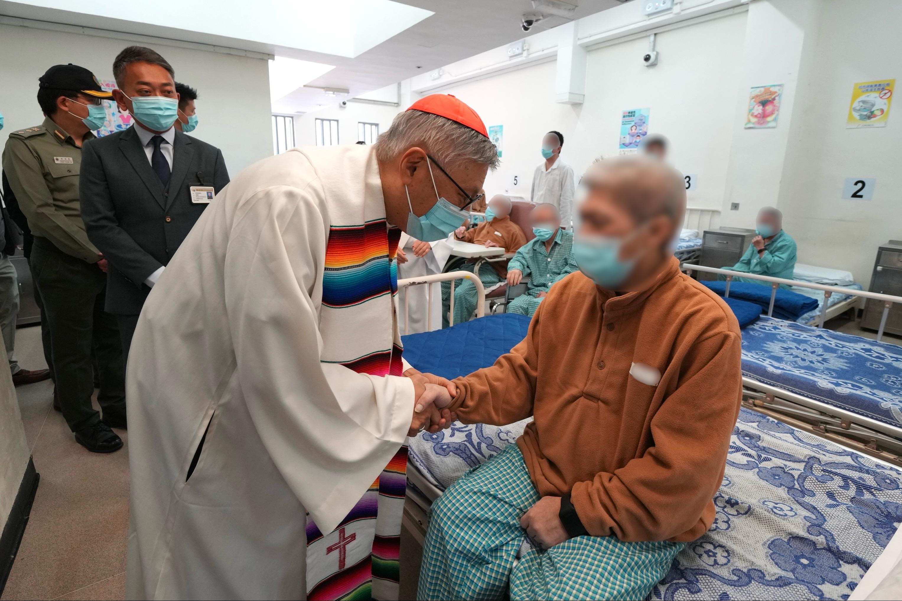 The Bishop of the Catholic Diocese of Hong Kong, Cardinal Stephen Chow (third left), accompanied by the Deputy Commissioner of Correctional Services (Operations and Strategic Development), Mr Leung Ka-lun (second left), visited the hospital in Stanley Prison to convey his sympathy and support to the sick persons in custody today (December 25).