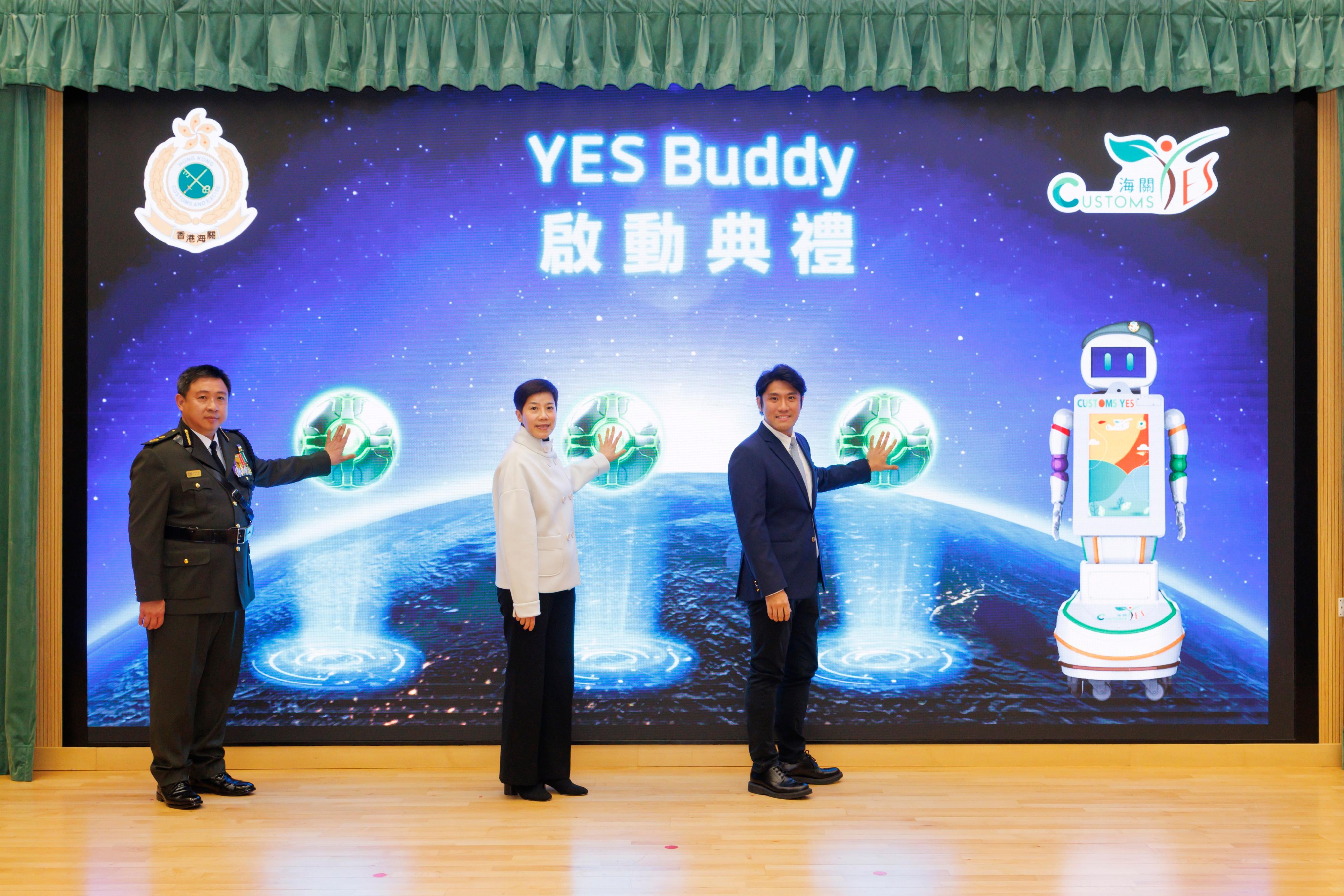 Hong Kong Customs held a graduation parade for the Customs Youth Leader Corps Winter Training Camp 2024 cum "YES Buddy" AI Robot Launching Ceremony at the Hong Kong Customs College today (December 27). Photo shows the Commissioner of Customs and Excise, Ms Louise Ho (centre), the Executive Director of the Executive Committee of Customs YES, Dr Eugene Chan (left), and Director of the Executive Committee of Customs YES, Dr Mark Mak (right) officiating at the launching ceremony. 