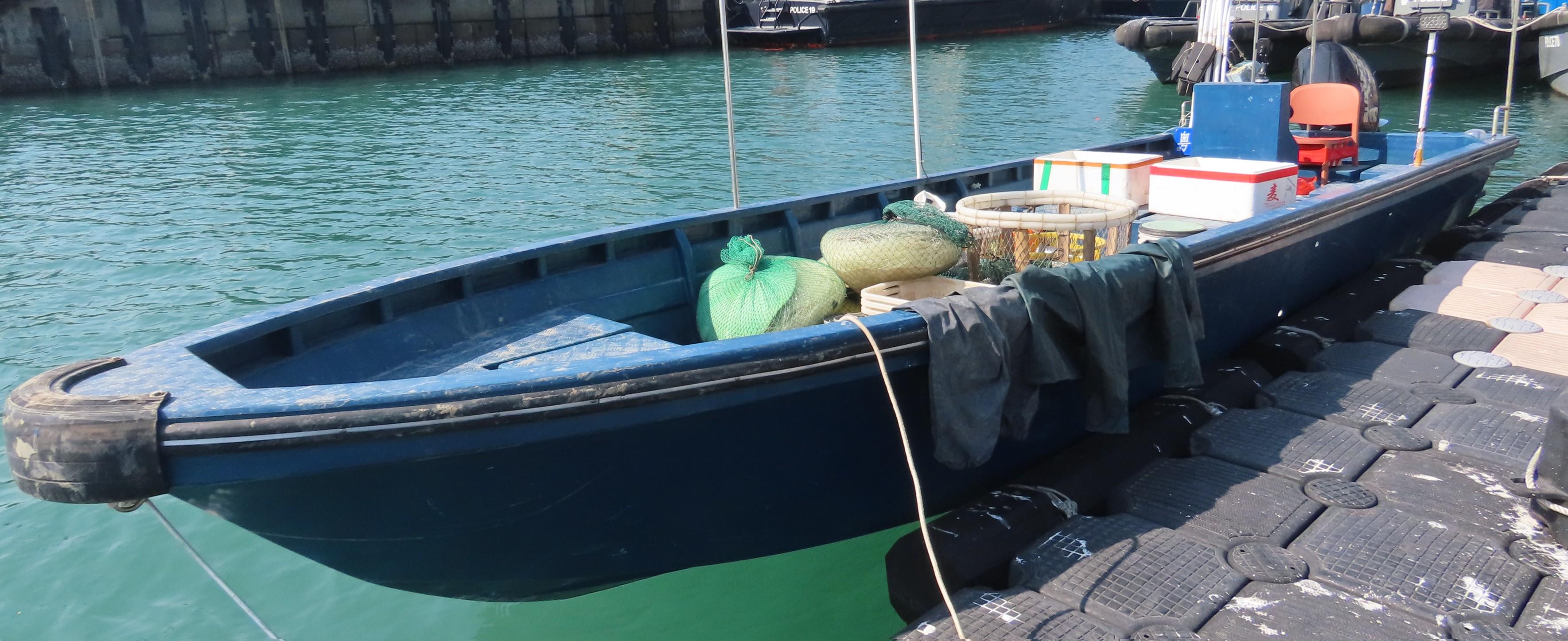 The Agriculture, Fisheries and Conservation Department today (January 3) laid charges against three male Mainlanders suspected of engaging in fishing using long lines in waters off Fan Lau Sai Wan. Photo shows the Mainland vessel concerned.