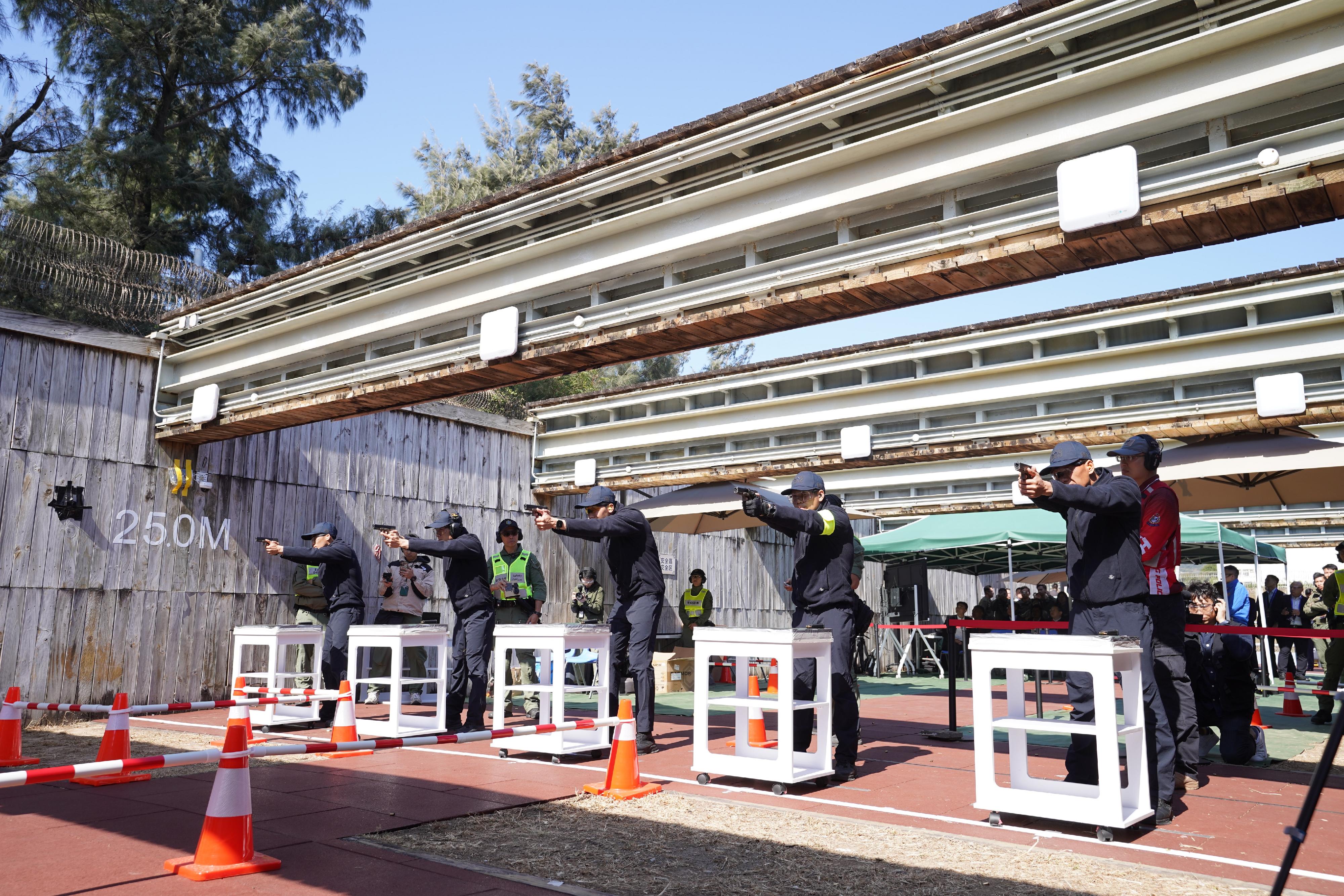 The first Greater Bay Area Correctional Services Tactical Skills Competition organised by the Correctional Services Department kicked off today (January 13), with the participation of over 100 correctional officers from the Mainland, Macao and Hong Kong. Photo shows correctional officers taking part in the Sharpshooters competition event.