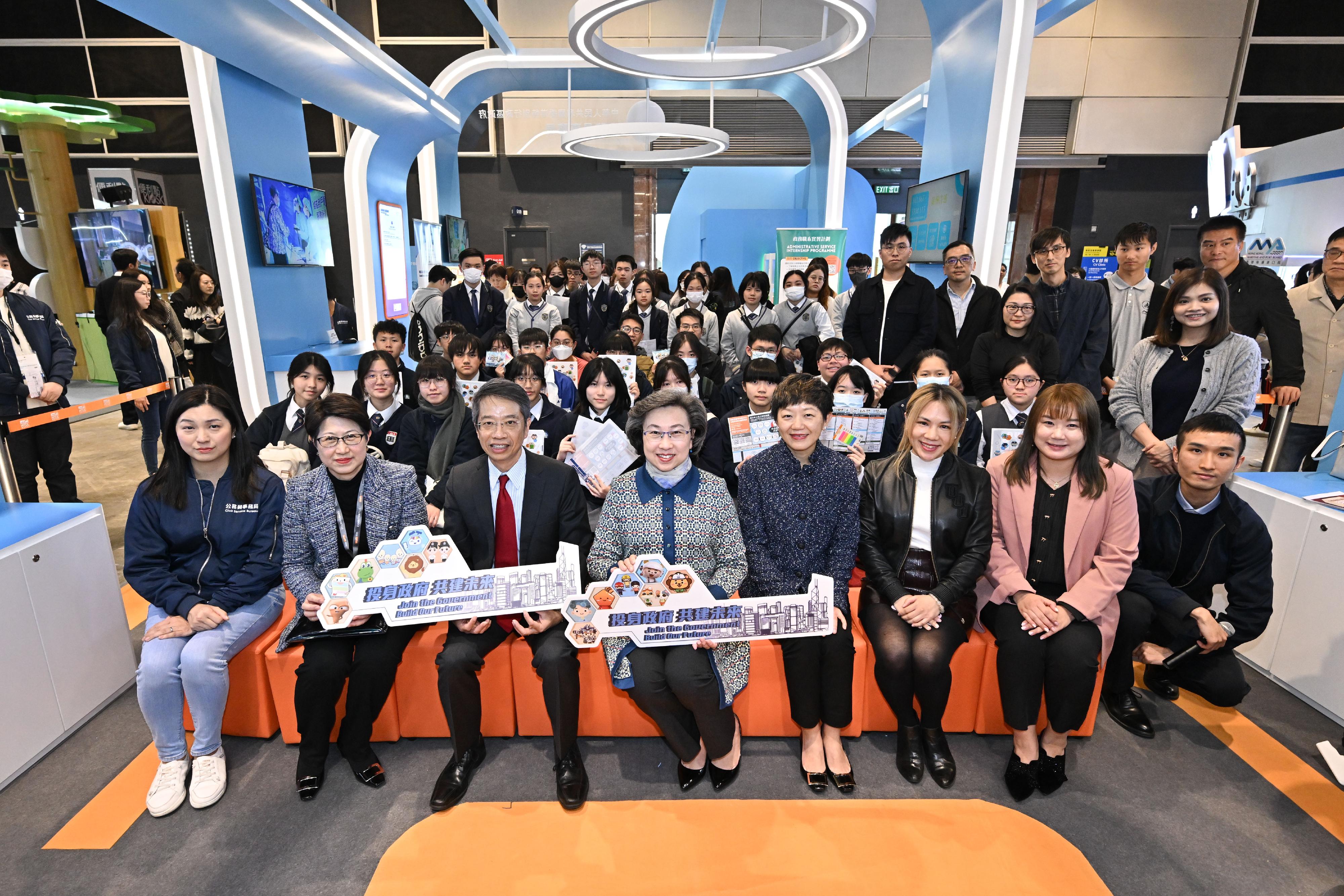 The Civil Service Bureau (CSB) has curated an exhibition area at the Education & Careers Expo 2025 from today (January 16) for four consecutive days to introduce the work of over 50 government grades and provide the public with information on civil service recruitment to enhance job seekers' understanding of government jobs. The Secretary for the Civil Service, Mrs Ingrid Yeung (front row, centre); the Permanent Secretary for the Civil Service, Mr Clement Leung (front row, third left); and Deputy Executive Director of Hong Kong Trade Development Council Ms Sophia Chong (front row, second left), are pictured with officers of Radio Television Hong Kong who introduce the work of the Assistant Programme Officer grade at a sharing session under the Careers in the Government Talk Series in the CSB's booth and the participating students.