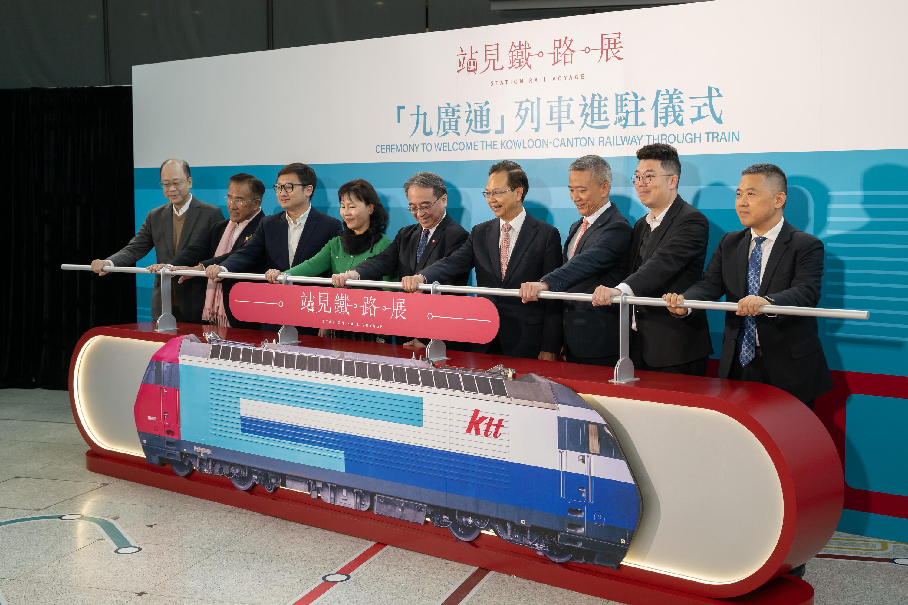 The Legislative Council (LegCo) Panel on Transport visited the Station Rail Voyage Exhibition of the MTR Corporation Limited (MTRCL) at Hung Hom Station today (January 17), which features new exhibits including the Kowloon-Canton Railway Through Train. Photo shows the Chairman of the LegCo Panel on Transport, Mr Chan Siu-hung (fourth right); the Deputy Chairman of the Panel, Mr Yiu Pak-leung (third right); and other LegCo Members attending the opening ceremony of new exhibits of the Station Rail Voyage Exhibition with the Secretary for Transport and Logistics, Ms Mable Chan (fourth left); the Chief Executive Officer of the MTRCL, Dr Jacob Kam (centre); and a representative of the Liaison Office of the Central People's Government in HKSAR.