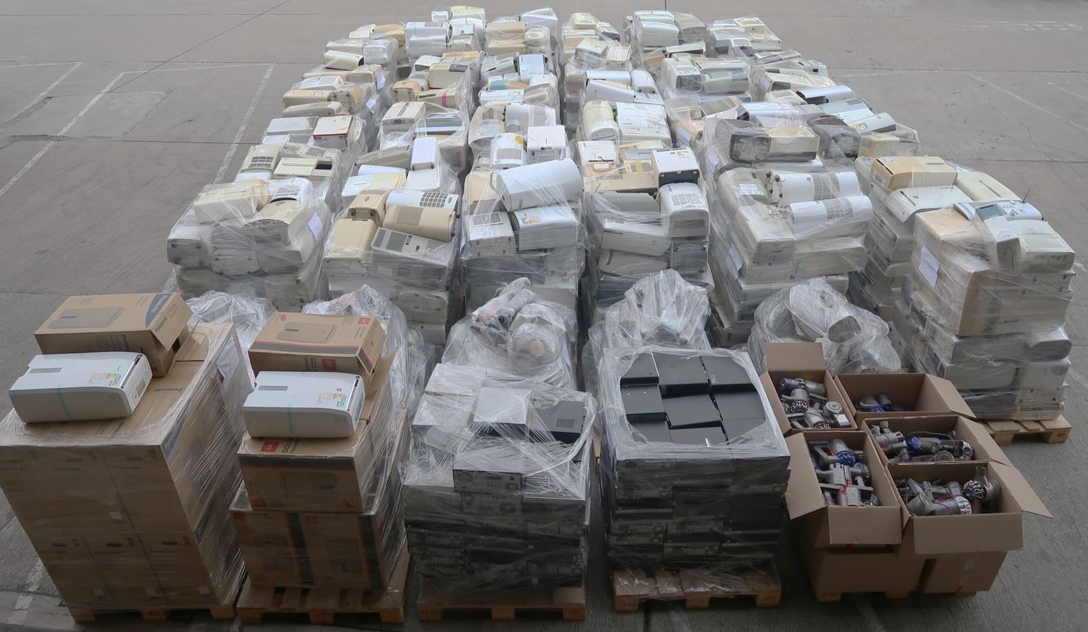 Hong Kong Customs detected a suspected smuggling case involving ocean-going vessels on January 14. A large batch of suspected smuggled goods, including dehumidifiers, computers and electrical fans, with an estimated market value of about $2 million was seized. Photo shows the suspected smuggled goods seized.