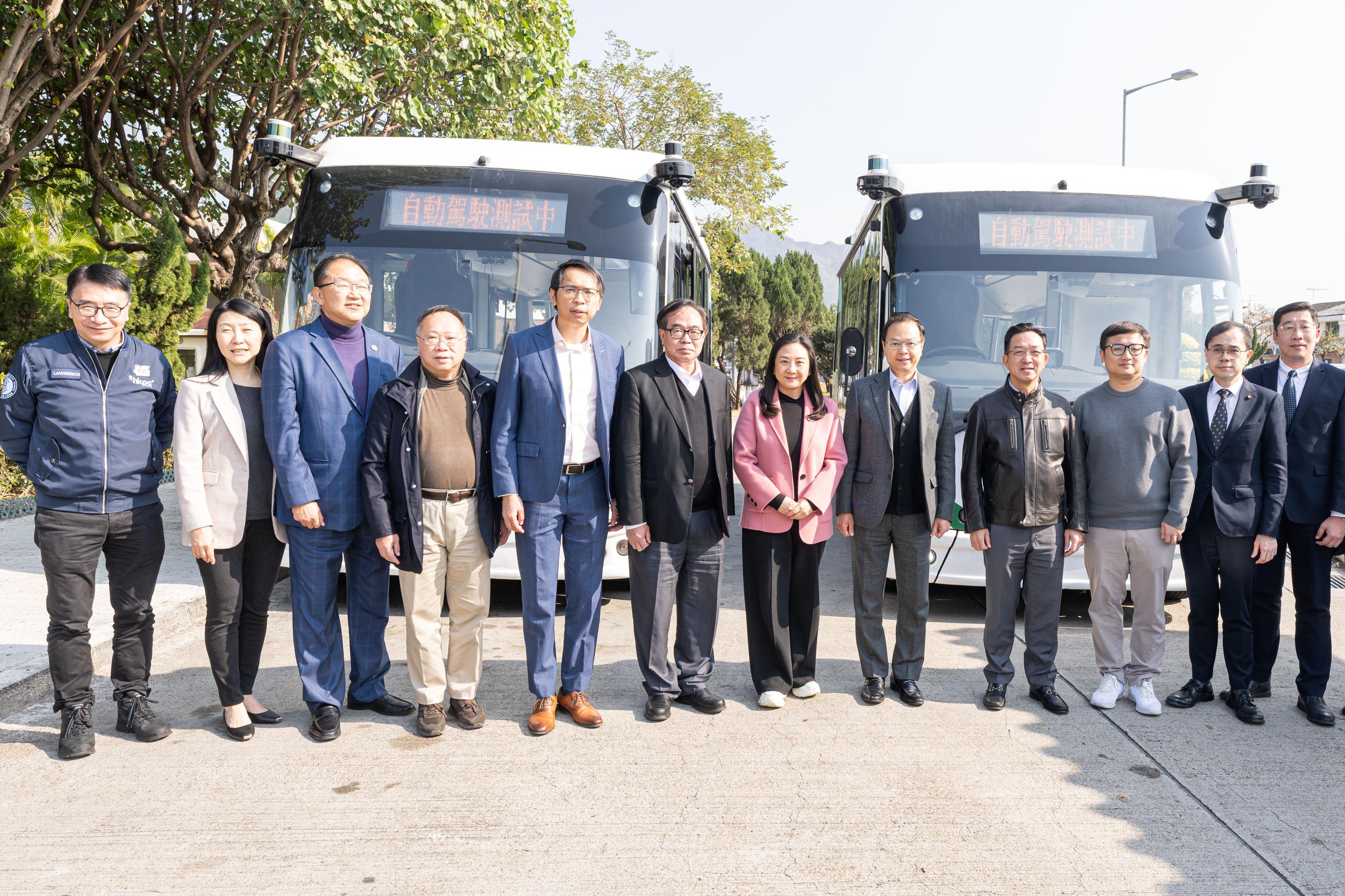 The Legislative Council Subcommittee on Matters Relating to the Development of Smart City visited Fairview Park in Yuen Long today (January 20) to observe the operation of autonomous shuttle light buses. Photo shows the Chairman of the Subcommittee on Matters Relating to the Development of Smart City, Ms Elizabeth Quat (sixth right), and other LegCo Members with representatives of the Administration and the Automotive Platforms and Application Systems R&D Centre.
