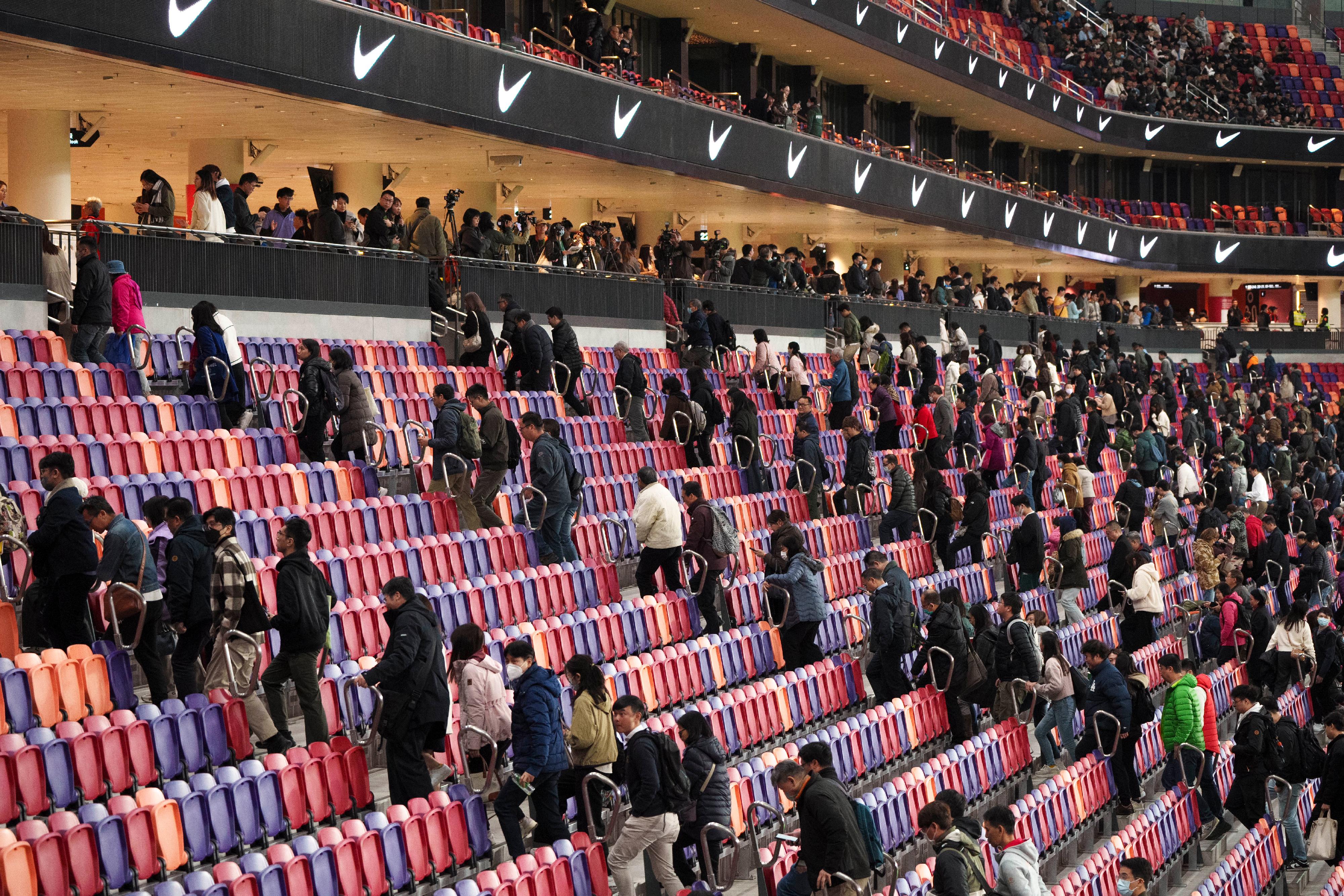 A large-scale stress test was conducted at Kai Tak Sports Park today (February 4). Photo shows participants leaving the Kai Tak Stadium.