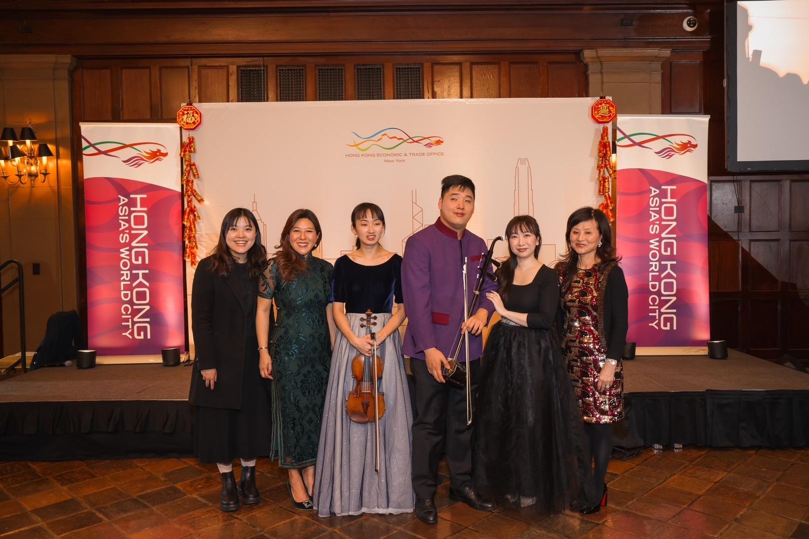 The Hong Kong Economic and Trade Office, New York (HKETONY) hosted its spring reception in New York on February 4 (New York time) to celebrate the Year of the Snake. Photo shows (from left): the Programme Manager of Arts with the Disabled Association Hong Kong, Ms Miller Cheung; the Director of the HKETONY, Ms Maisie Ho; violinist Ding Yijie and erhu player Yang Enhua (both from the Arts with the Disabled Association Hong Kong); professional pianist Laurina Hong; and world-renowned erhu master Chen Jiebing.