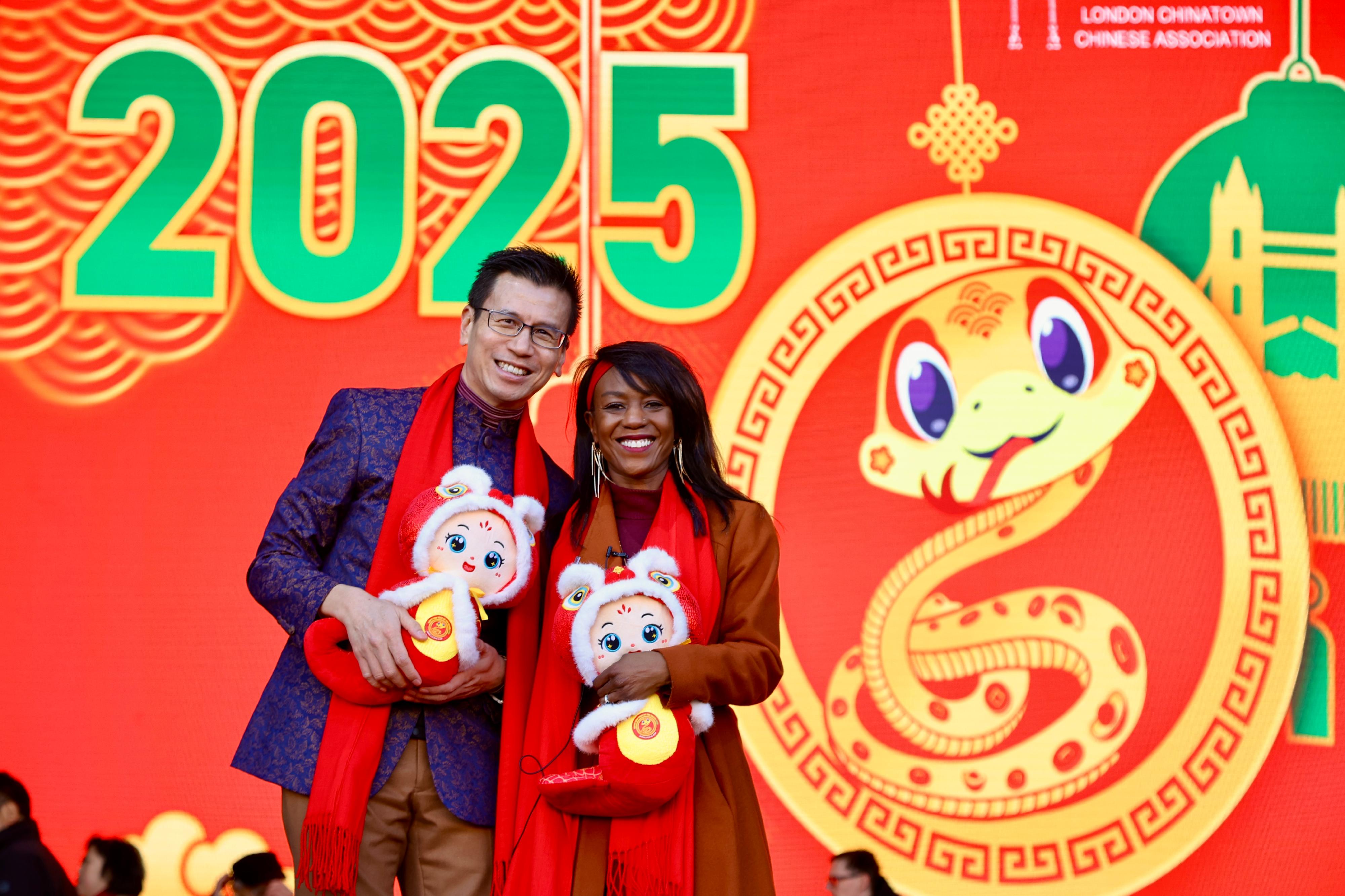 The Hong Kong Economic and Trade Office, London (London ETO) greeted the Year of the Snake in the United Kingdom by supporting a large-scale London Chinatown celebration at Trafalgar Square, Chinatown, and Charing Cross Road in London on February 2. Photo shows the Director-General of the London ETO, Mr Gilford Law (left), and Deputy Mayor for Communities and Social Justice of London, Dr Debbie Weekes-Bernard (right), at the celebration.