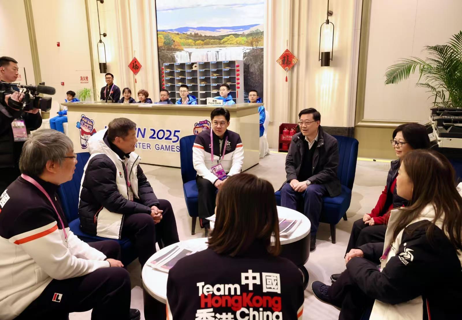 The Chief Executive, Mr John Lee, continued his visit programme in Harbin today (February 8). Photo shows Mr Lee (second right) visiting members of the Hong Kong, China Delegation at the athletes' village of the 9th Asian Winter Games Harbin 2025 and learning about their preparations. Looking on is Vice President of the Sports Federation & Olympic Committee of Hong Kong, China and the Chef de Mission of the Hong Kong, China Delegation to the 9th Asian Winter Games Harbin 2025, Mr Kenneth Fok (third right).
