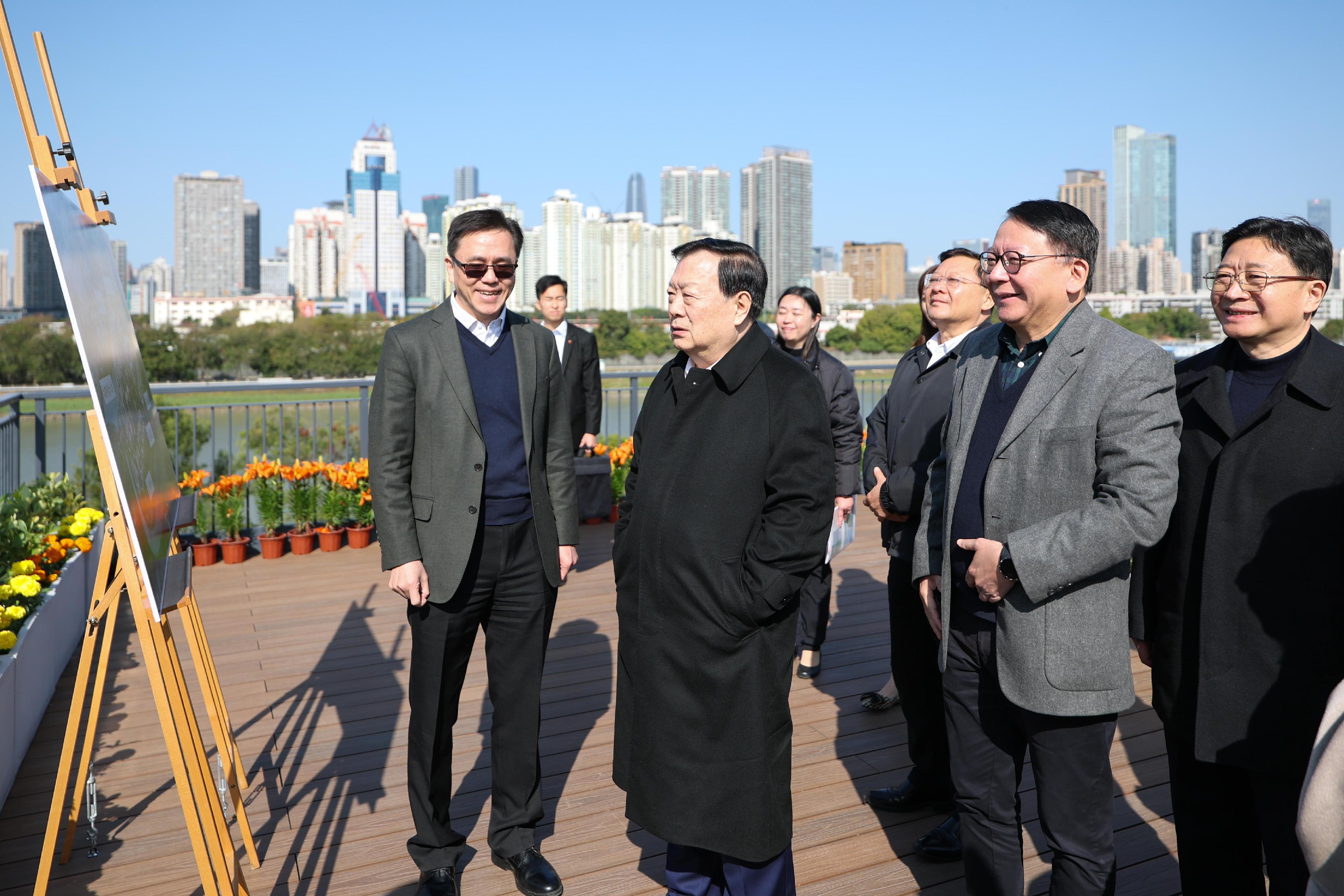 The Director of the Hong Kong and Macao Work Office of the Communist Party of China Central Committee and the Hong Kong and Macao Affairs Office (HKMAO) of the State Council, Mr Xia Baolong (first row, centre), inspected the Hong Kong Park of the Hetao Shenzhen-Hong Kong Science and Technology Innovation Co-operation Zone yesterday (February 9). Looking on are the Governor of Guangdong Province and Deputy Head of the Office of the Leading Group on Construction of the Guangdong-Hong Kong-Macao Greater Bay Area of Guangdong Province, Mr Wang Weizhong (second row, second right); Executive Deputy Director of the Hong Kong and Macao Work Office of the Communist Party of China Central Committee and the HKMAO of the State Council, Mr Zhou Ji (second row, first right); the Acting Chief Executive, Mr Chan Kwok-ki (first row, right); and the Secretary for Innovation, Technology and Industry, Professor Sun Dong (first row, left).