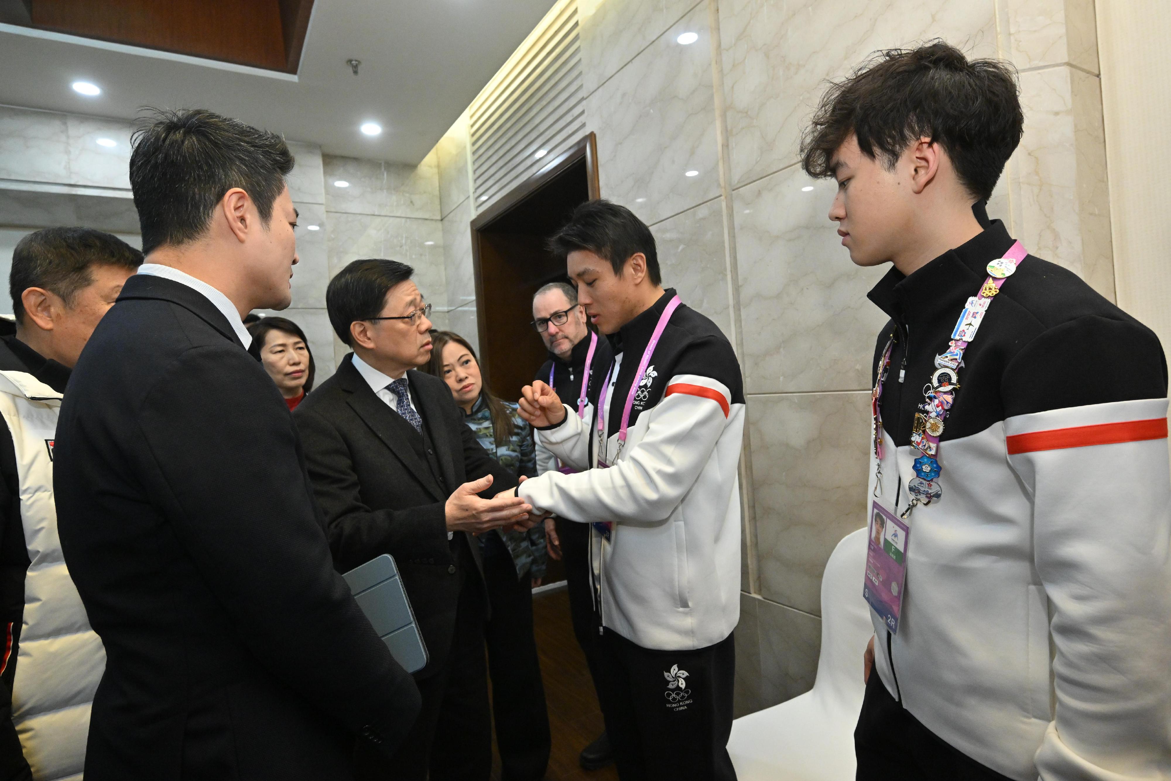 The Chief Executive, Mr John Lee, continued his visit to Harbin today (February 10). Photo shows Mr Lee (third right) visiting Hong Kong athletes who were injured after an ice hockey competition at the 9th Asian Winter Games Harbin 2025.