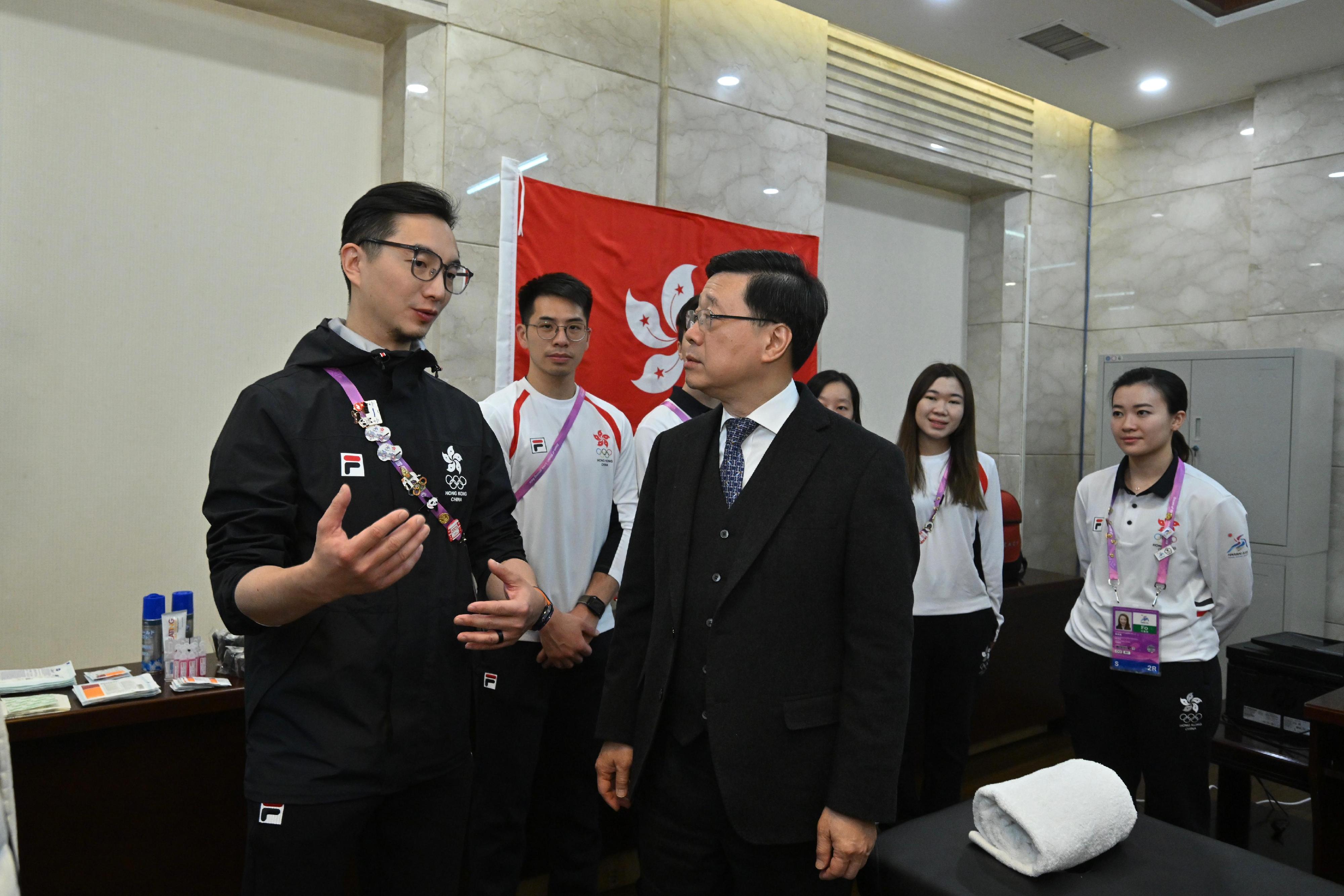 The Chief Executive, Mr John Lee, continued his visit to Harbin today (February 10). Photo shows Mr Lee (third left) visiting Hong Kong athletes who were injured after an ice hockey competition at the 9th Asian Winter Games Harbin 2025 and interacting with the team.