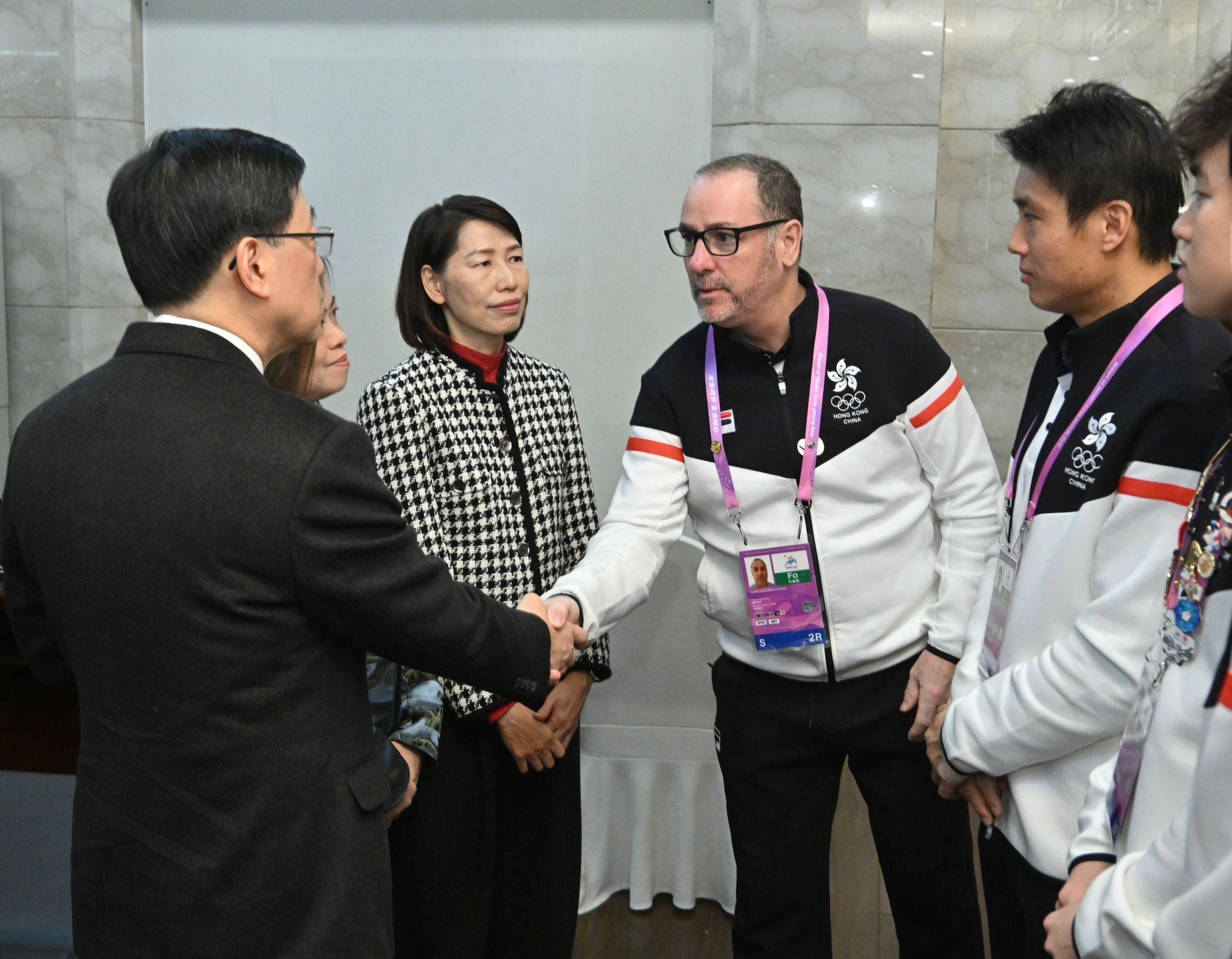 The Chief Executive, Mr John Lee, continued his visit to Harbin today (February 10). Photo shows Mr Lee (first left) visiting Hong Kong athletes who were injured after an ice hockey competition at the 9th Asian Winter Games Harbin 2025 and interacting with the team.
