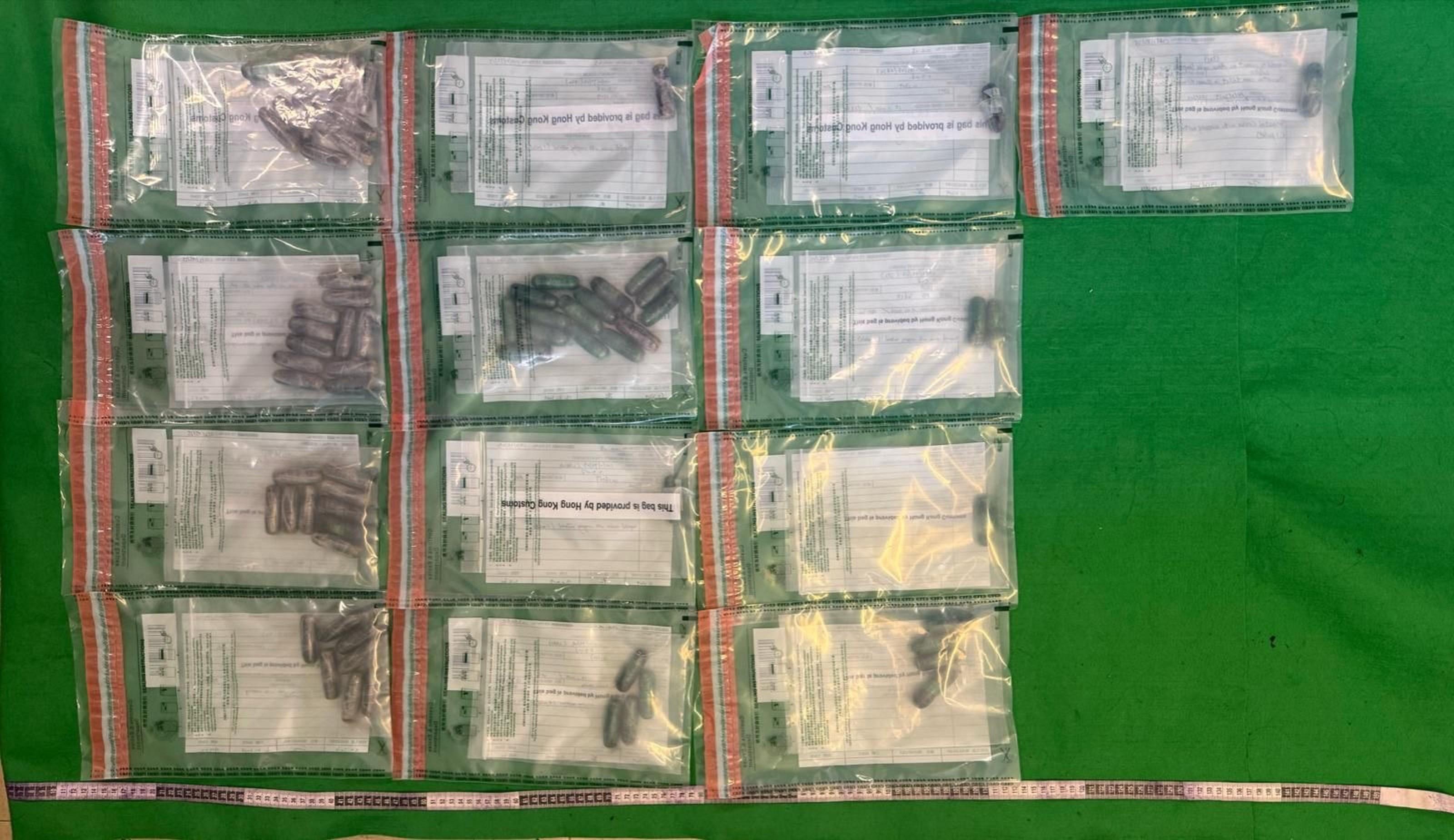 Hong Kong Customs detected a dangerous drugs internal concealment case involving four incoming passengers at Hong Kong International Airport on February 14 and seized about 900 grams of suspected cocaine with an estimated market value of about $730,000. Photo shows the suspected cocaine seized.