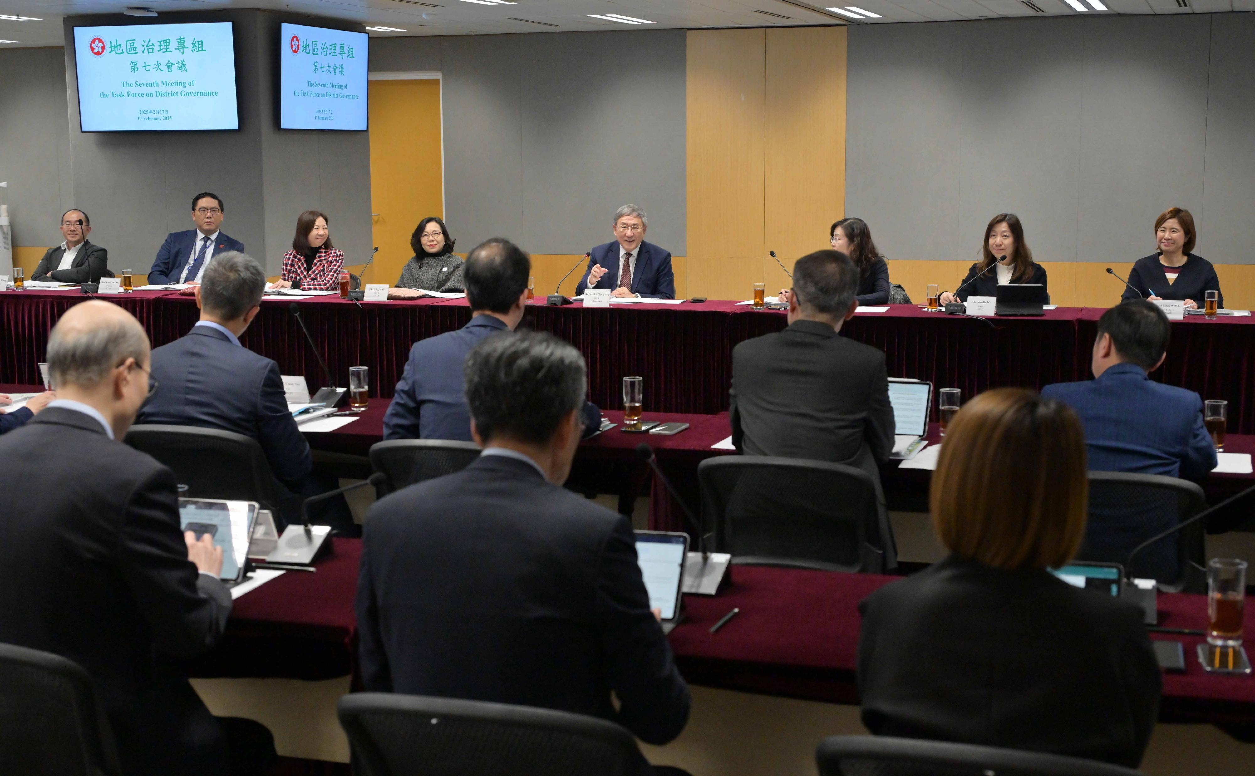 The Deputy Chief Secretary for Administration, Mr Cheuk Wing-hing (fourth right), chairs the seventh meeting of the Task Force on District Governance today (February 17). Next to Mr Cheuk is the Secretary for Home and Youth Affairs, Miss Alice Mak (fourth left).