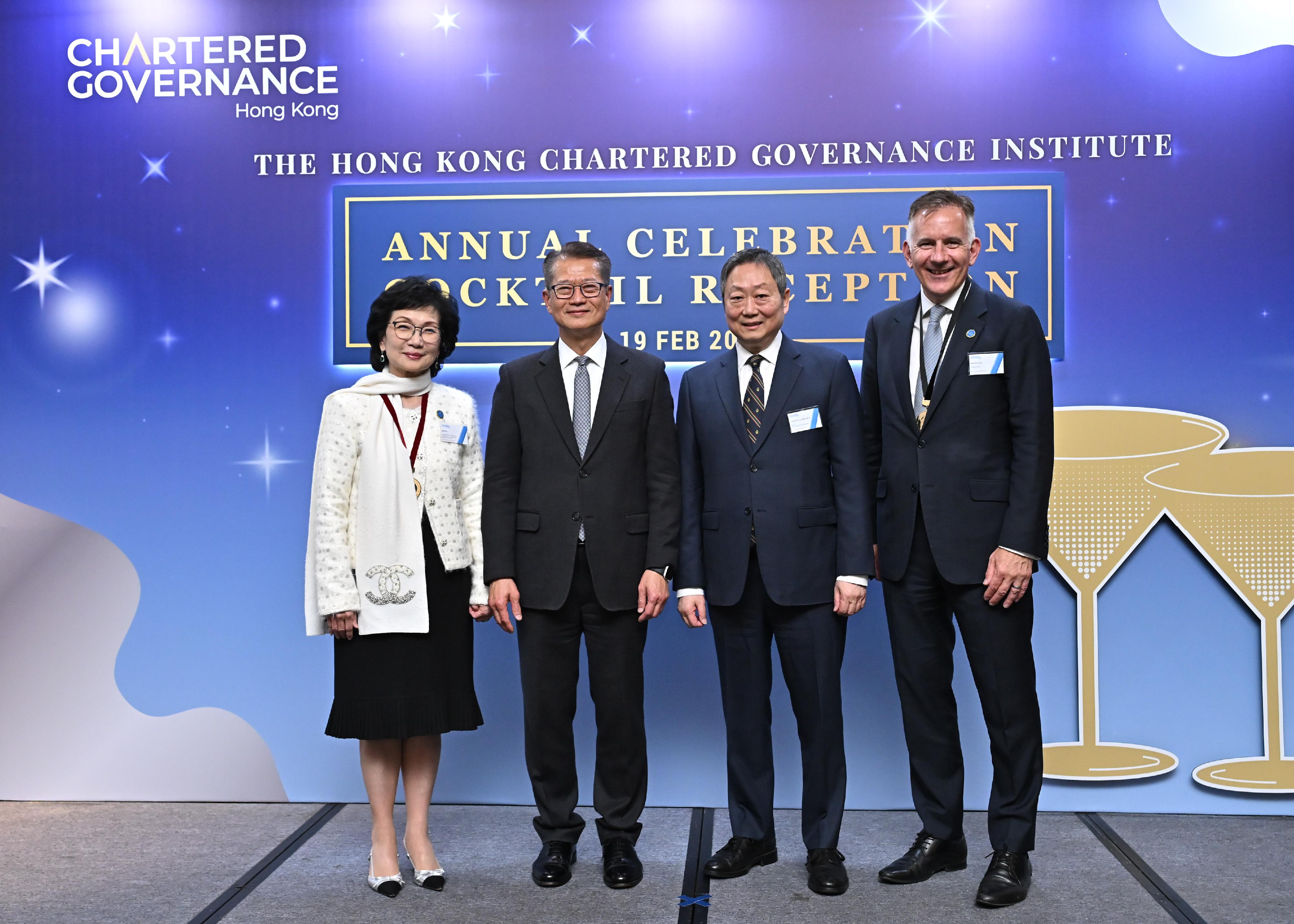 The Financial Secretary, Mr Paul Chan, attends the Hong Kong Chartered Governance Institute (HKCGI) Annual Celebration Reception 2025 today (February 19). Photo shows Mr Chan (second left); the Chairman of the Securities and Futures Commission, Dr Kelvin Wong (second right); the President of the HKCGI, Mr David Simmonds (first right); and past President of the HKCGI, Ms Edith Shih (first left).