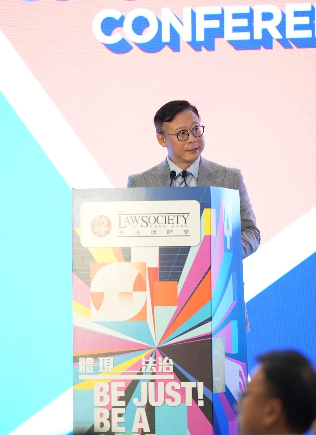 The Deputy Secretary for Justice, Dr Cheung Kwok-kwan, speaks at the Sports Law Conference luncheon organised by the Law Society of Hong Kong today (February 21).
