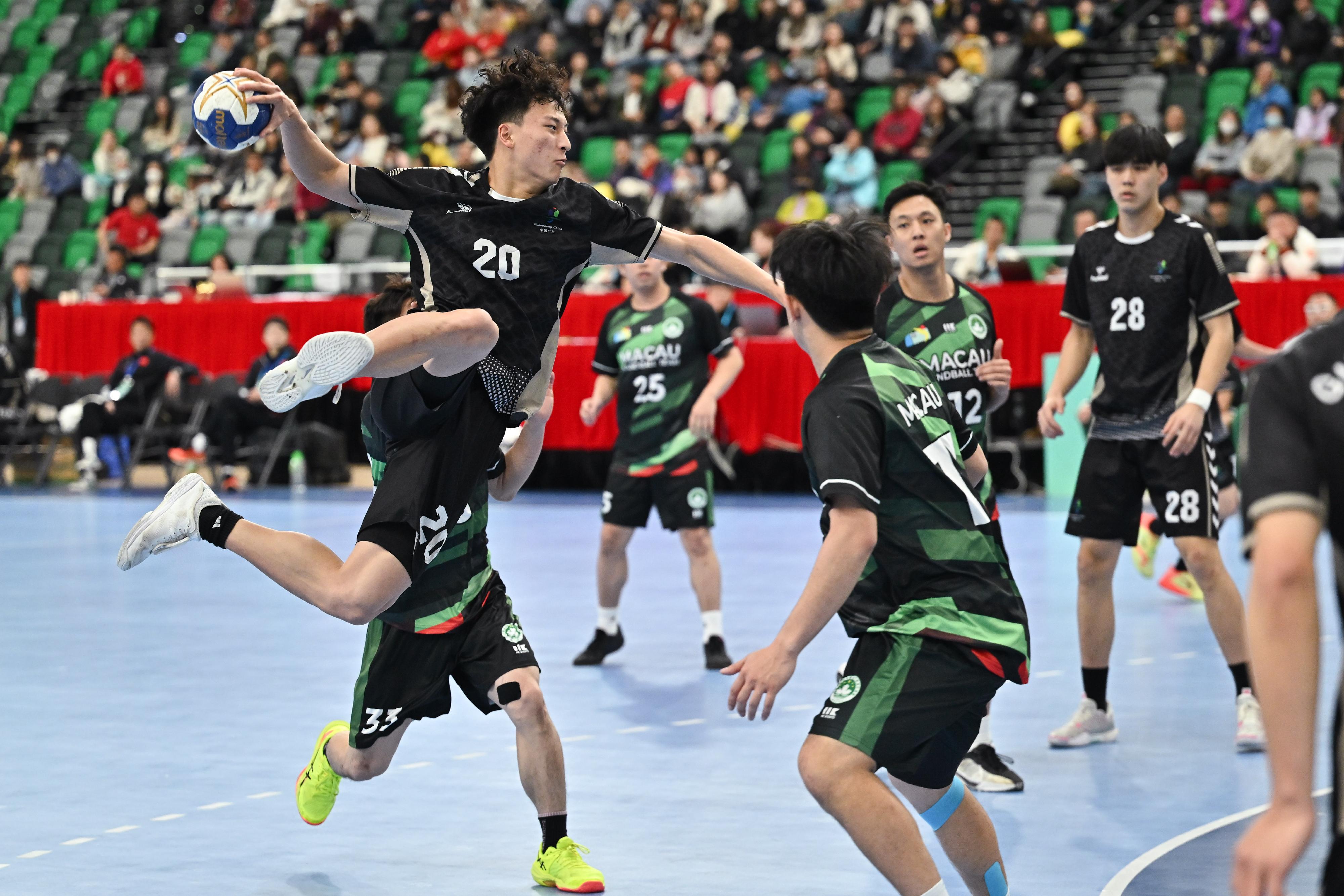 The 15th National Games Handball (Men) Test Event was held at Kai Tak Arena, Kai Tak Sports Park today (February 23). Photos shows Guangdong Men's Handball Team competing with Macao Men's Handball Team at the event.