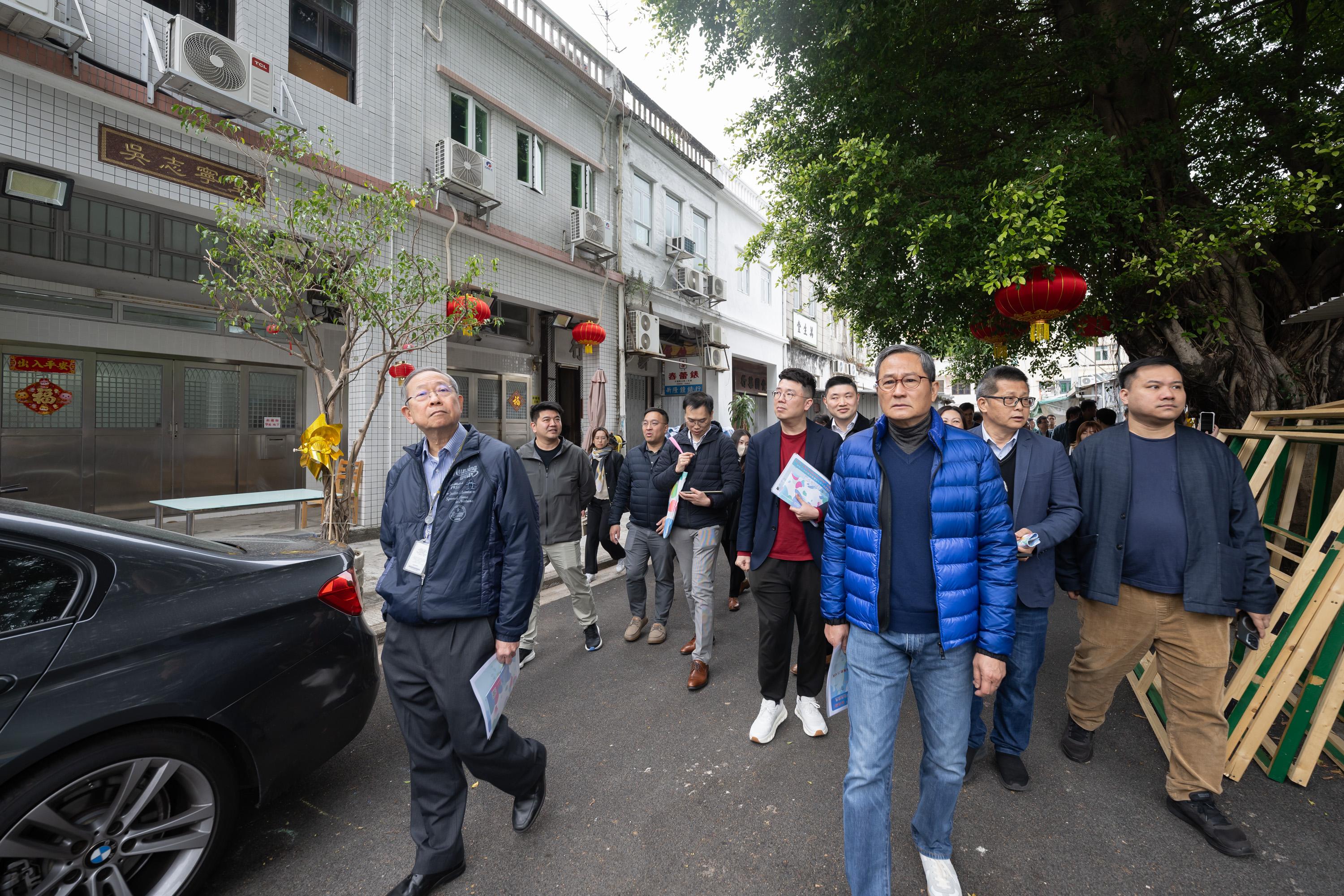 Legislative Council (LegCo) Members, together with North District Council members, conducted a site visit to Sha Tau Kok today (February 25). Photo shows LegCo Members visiting San Lau Street in Sha Tau Kok.
