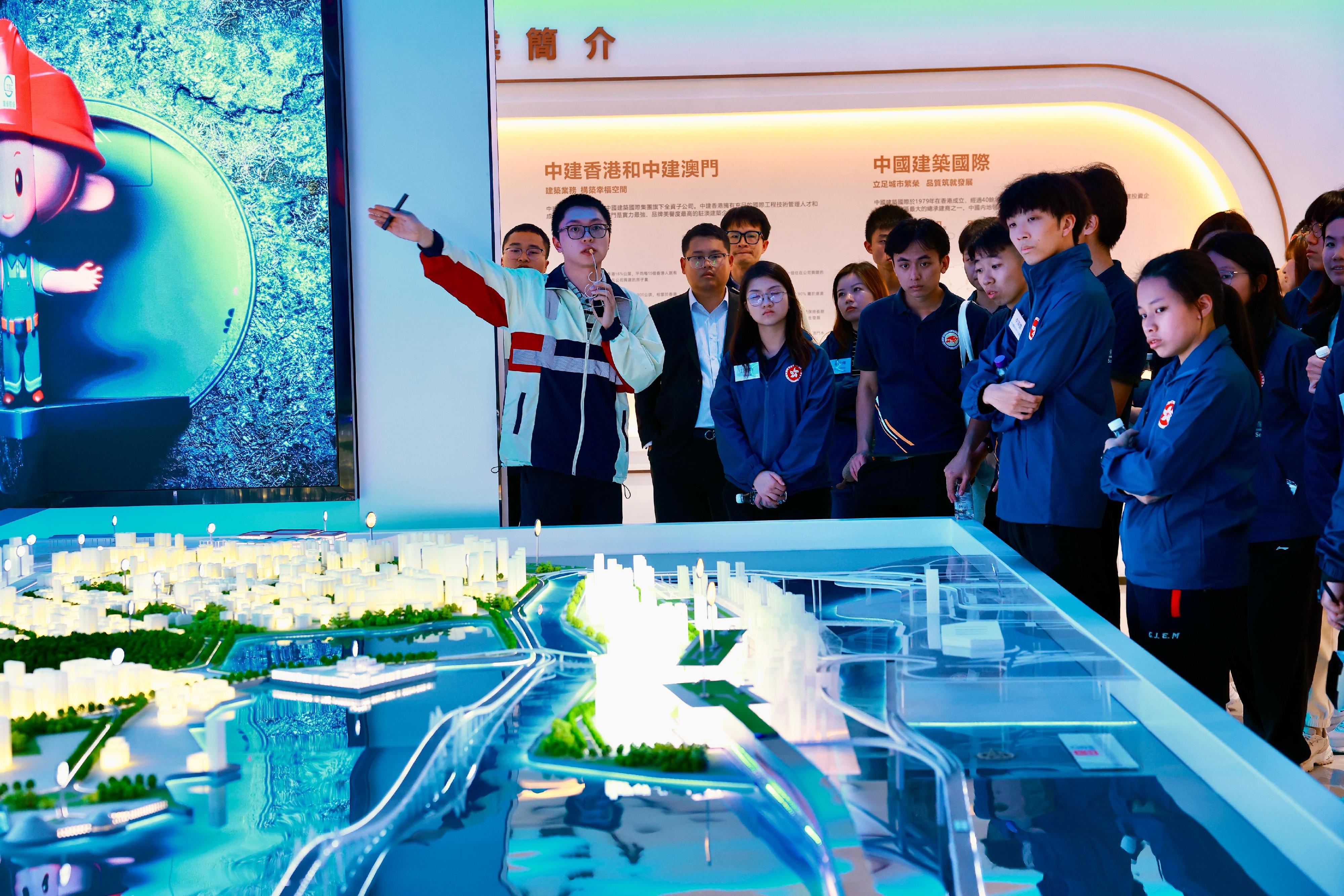 The Secretary for Security, Mr Tang Ping-keung, today (March 2) led members of the Security Bureau Youth Uniformed Group Leaders Forum on a Greater Bay Area study tour in Macao, completing a three-day, two-night exploration of national history and culture, as well as developments in various fields. Photo shows members of the study tour visiting the Macao Light Rapid Transit East Line South Section.