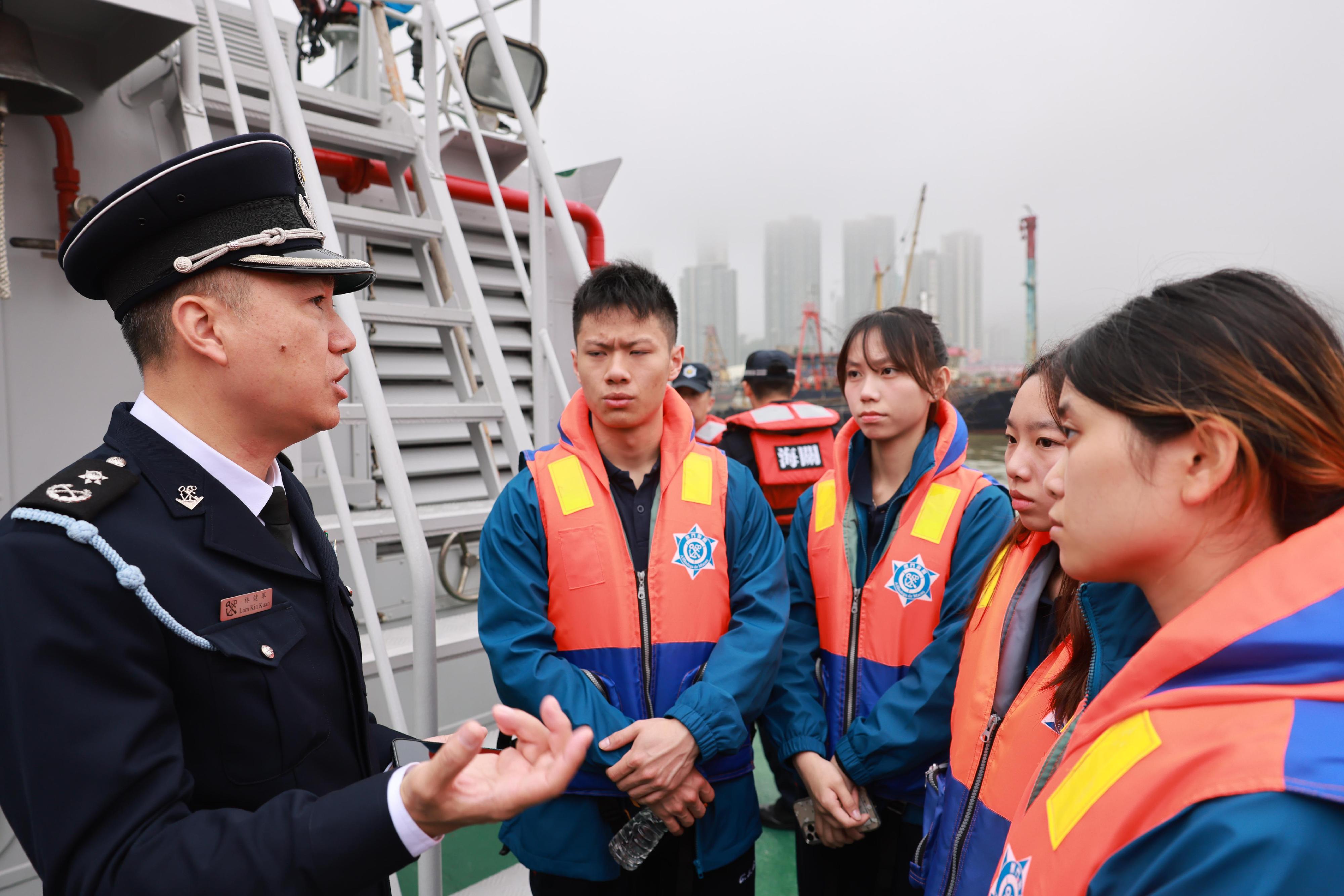 The Secretary for Security, Mr Tang Ping-keung, today (March 2) led members of the Security Bureau Youth Uniformed Group Leaders Forum on a Greater Bay Area study tour in Macao, completing a three-day, two-night exploration of national history and culture, as well as developments in various fields. Photo shows members of the study tour visiting the Macao Customs Fleet.